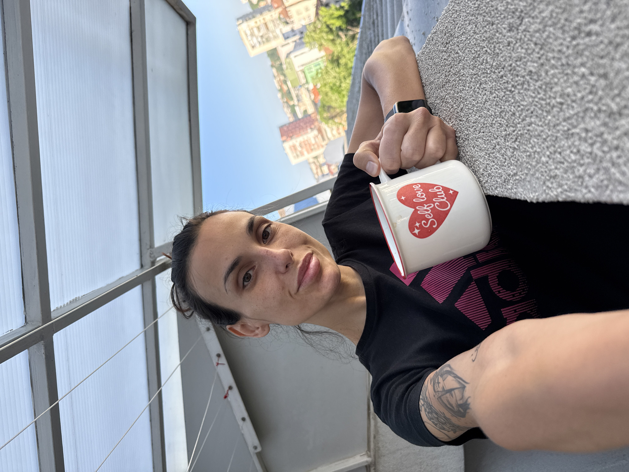 Woman documents morning routine, views soccer cards in Bulgaria