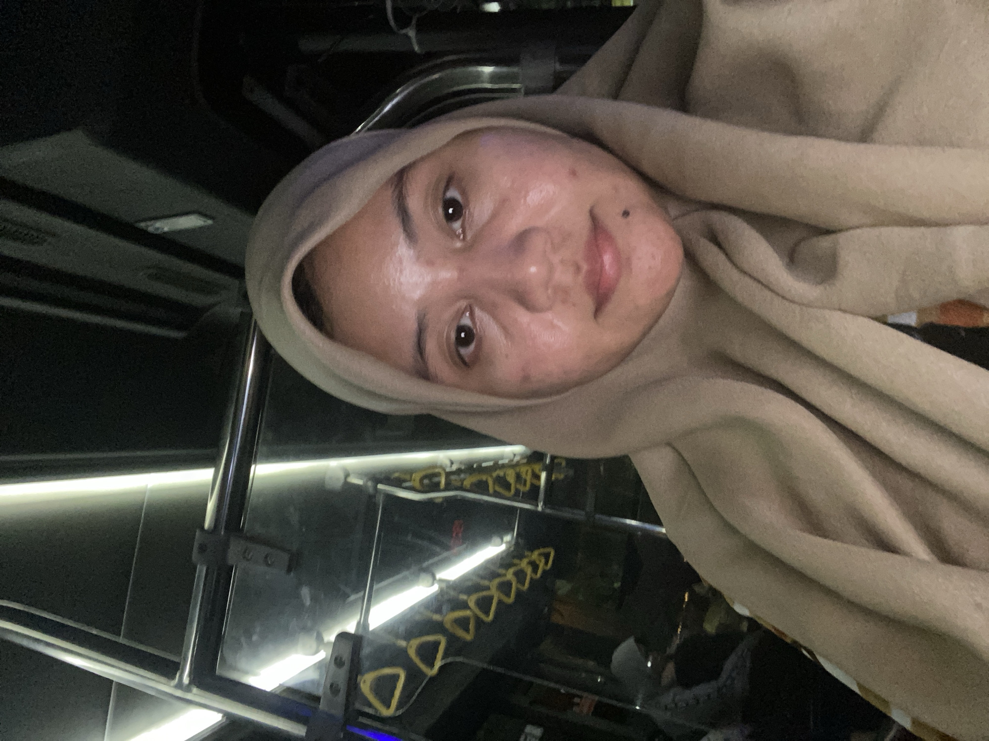 Night bus ride through rainy Banjarmasin streets