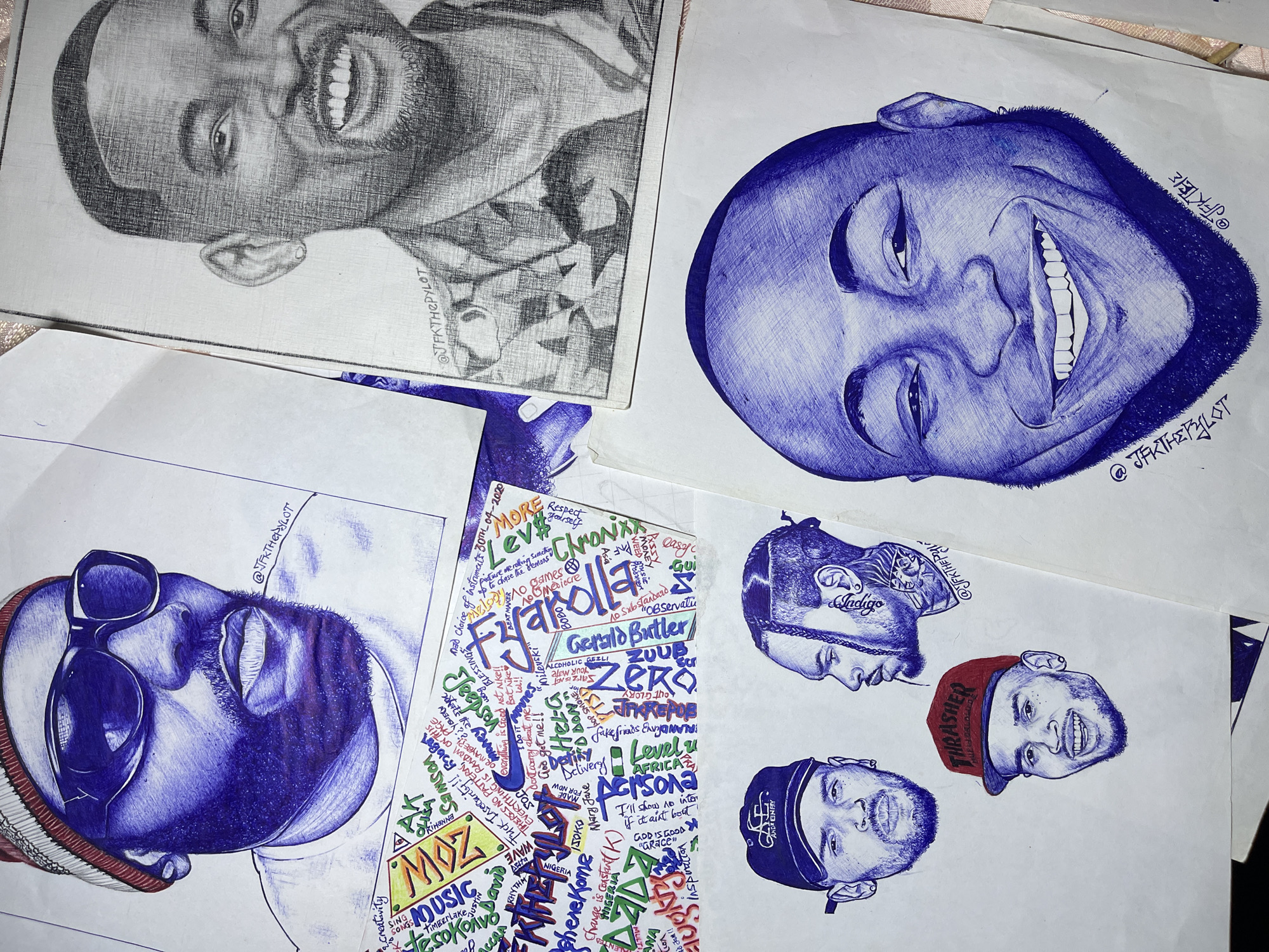 Blue pen portrait drawings spread out in Jos, Nigeria