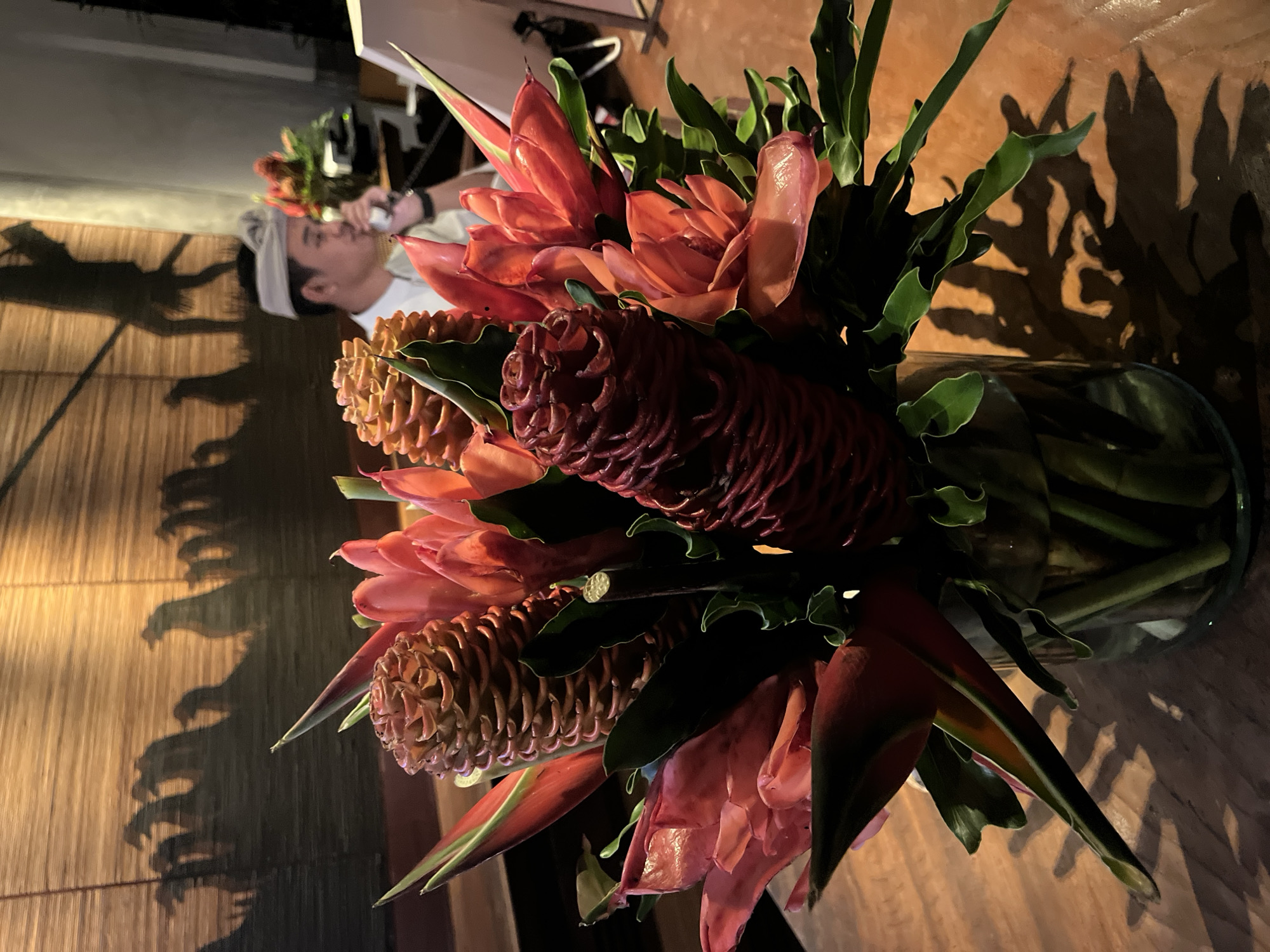 Rotated photos capture tropical flowers and lounge in Ubud