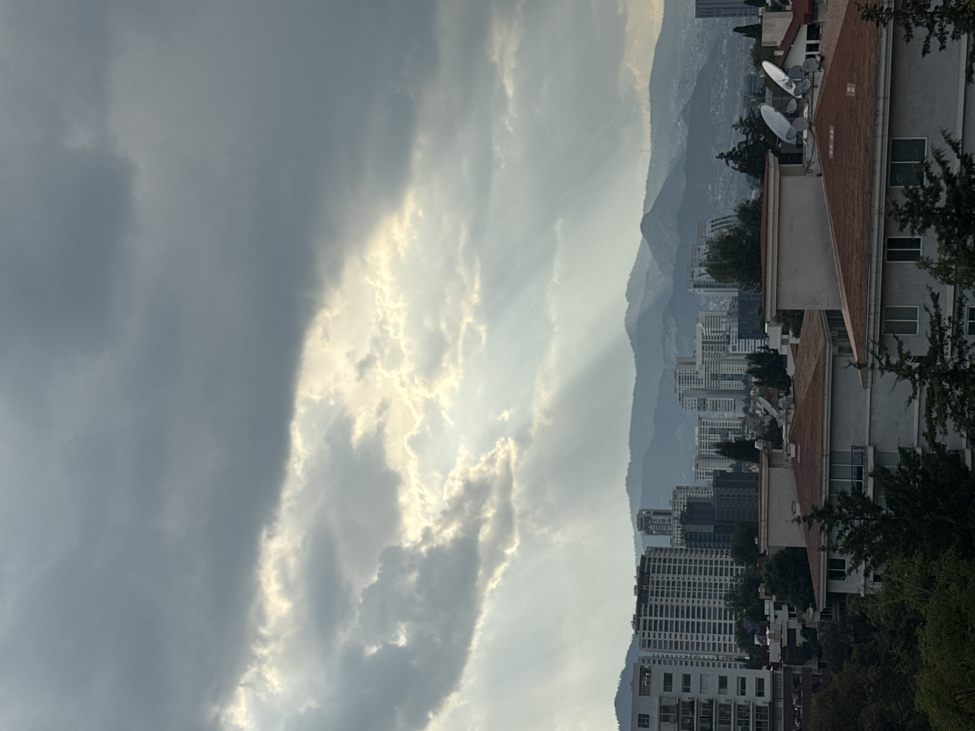 Dramatic clouds and selfie moment captured in Mexico City