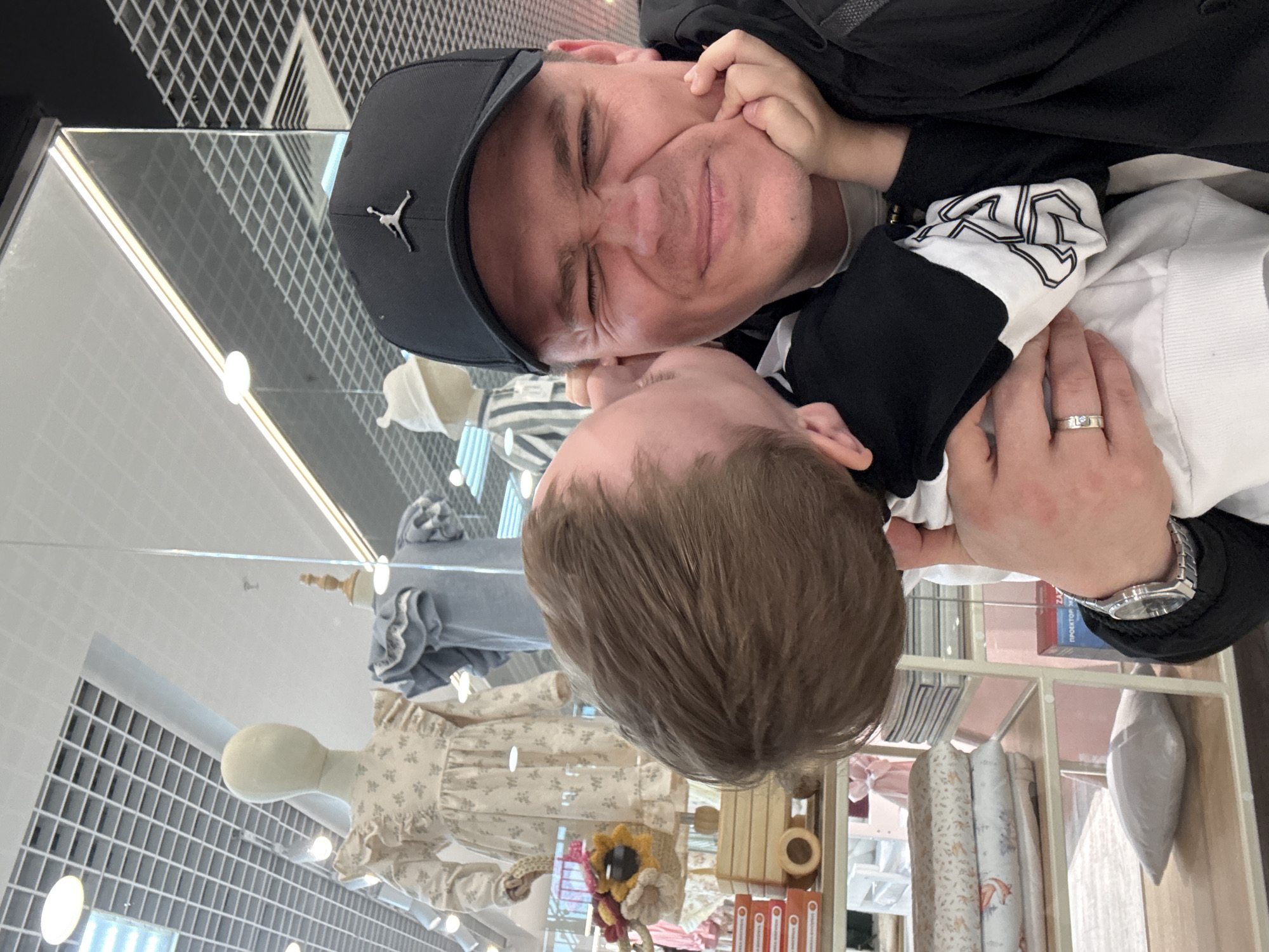 Father and child enjoy morning outing at Vladivostok mall