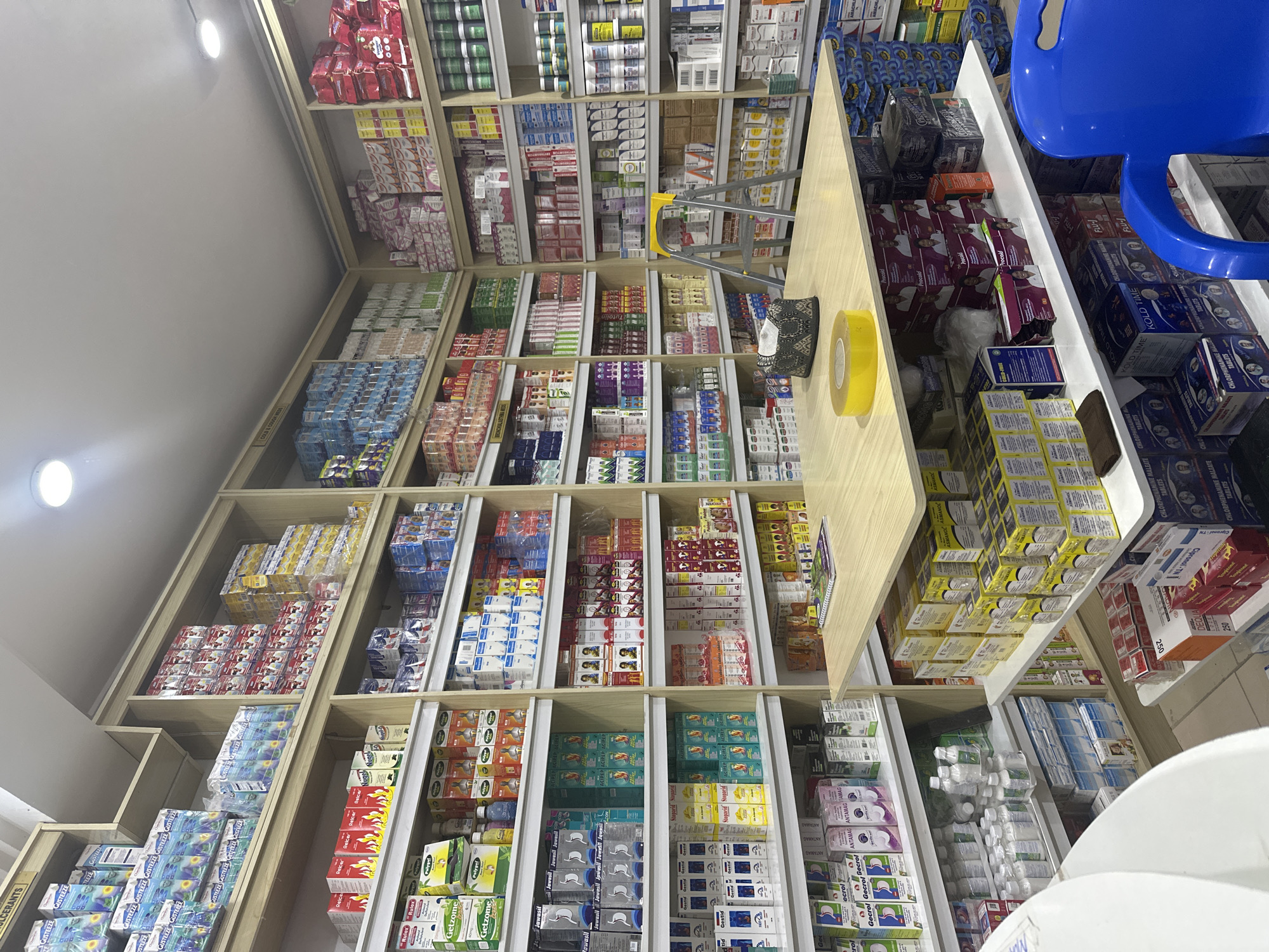 Inside a well-stocked pharmacy near Muhammadu Dikko Stadium, Nigeria