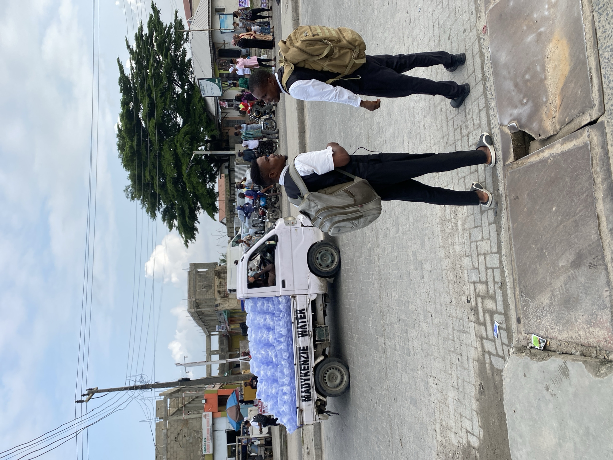 Street life on a busy West African city block