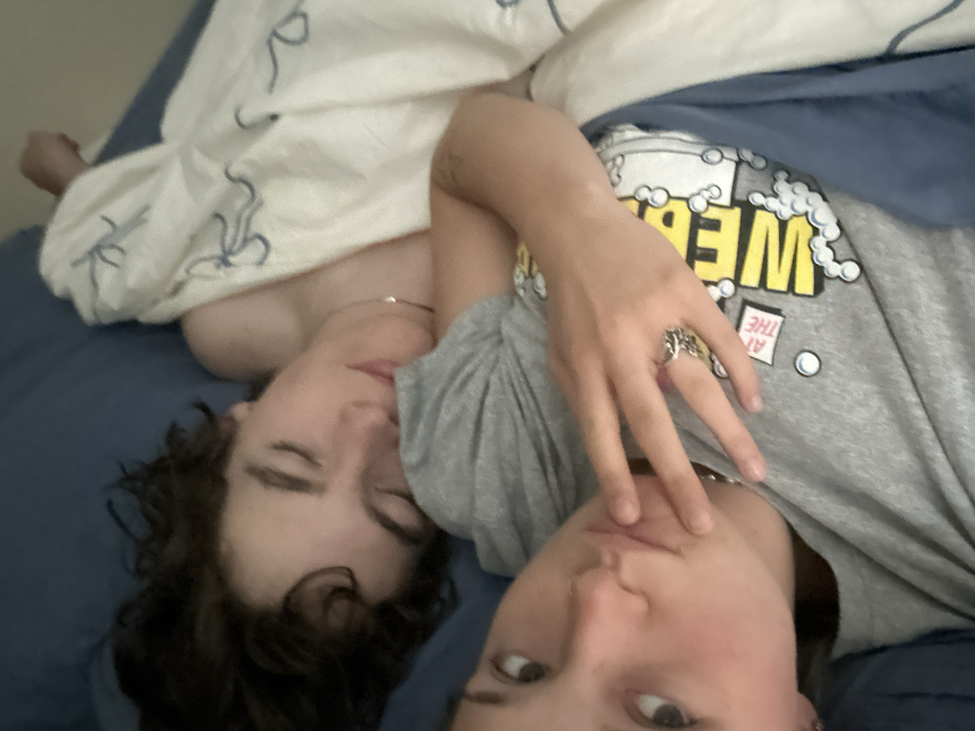 Two people rest together on bed in Whistler