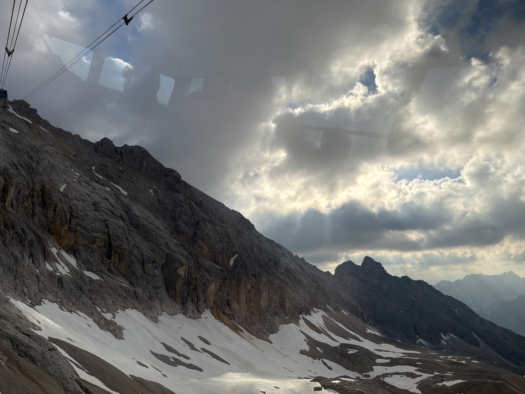 Up close with the Zugspitze: rocky peaks, snow, and cloud