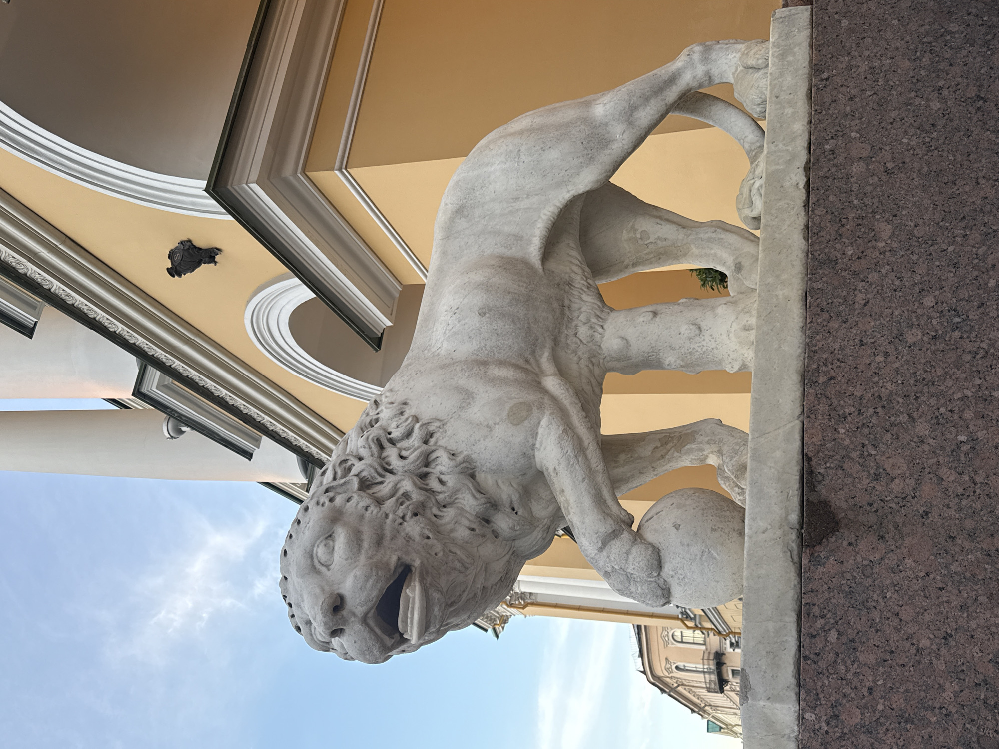 Saint Petersburg landmarks and lion statues on a June evening