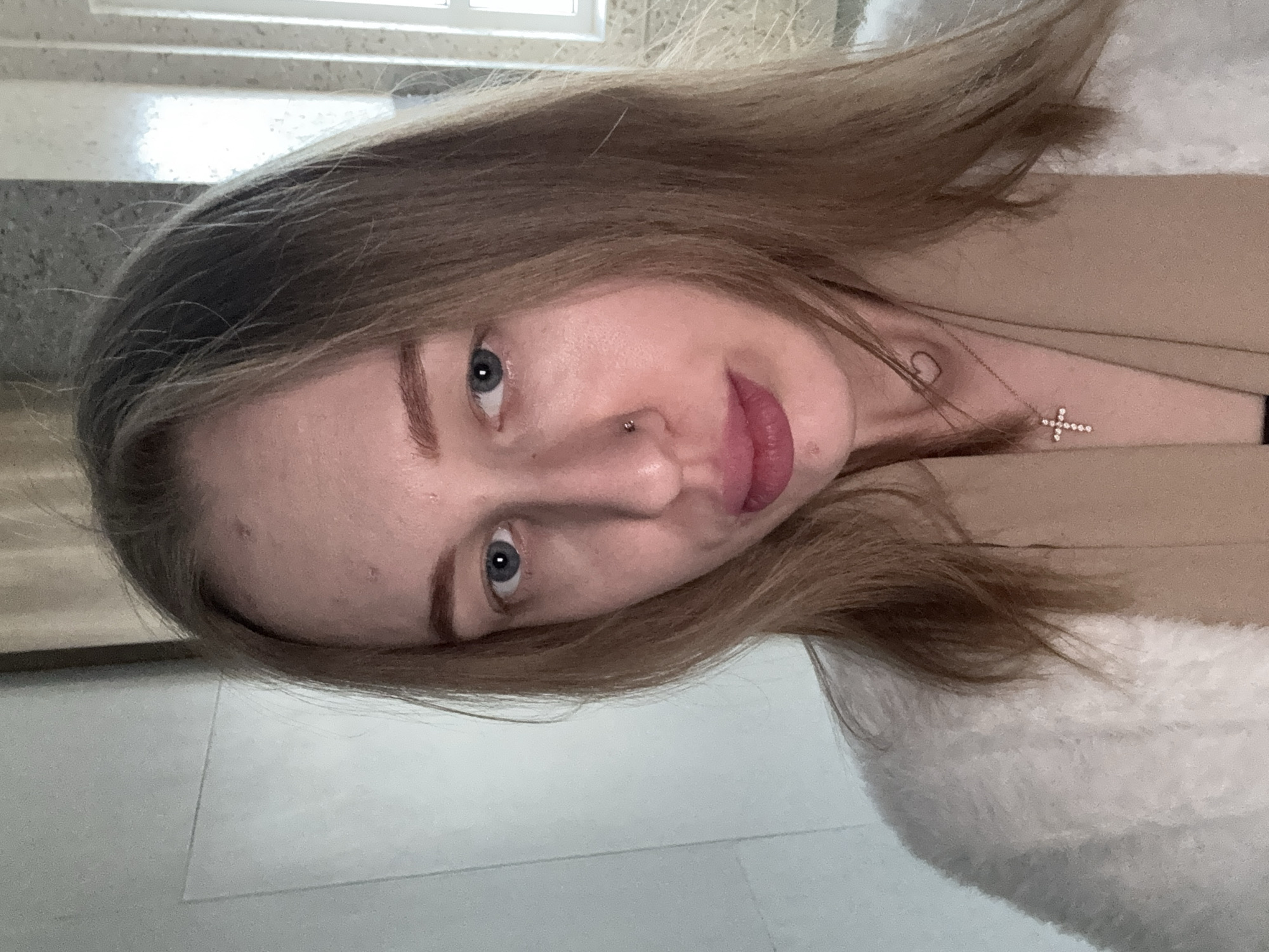 Woman spotted in tan coat in Ovoshchnoy, Russia