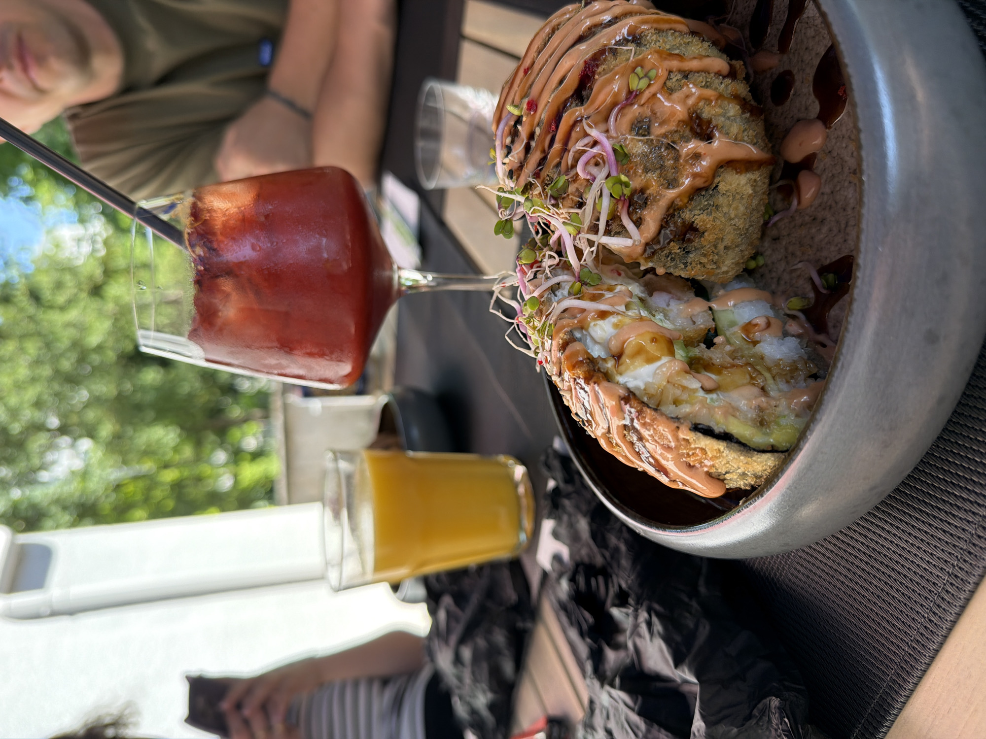Outdoor sushi lunch documented at Basel restaurant patio