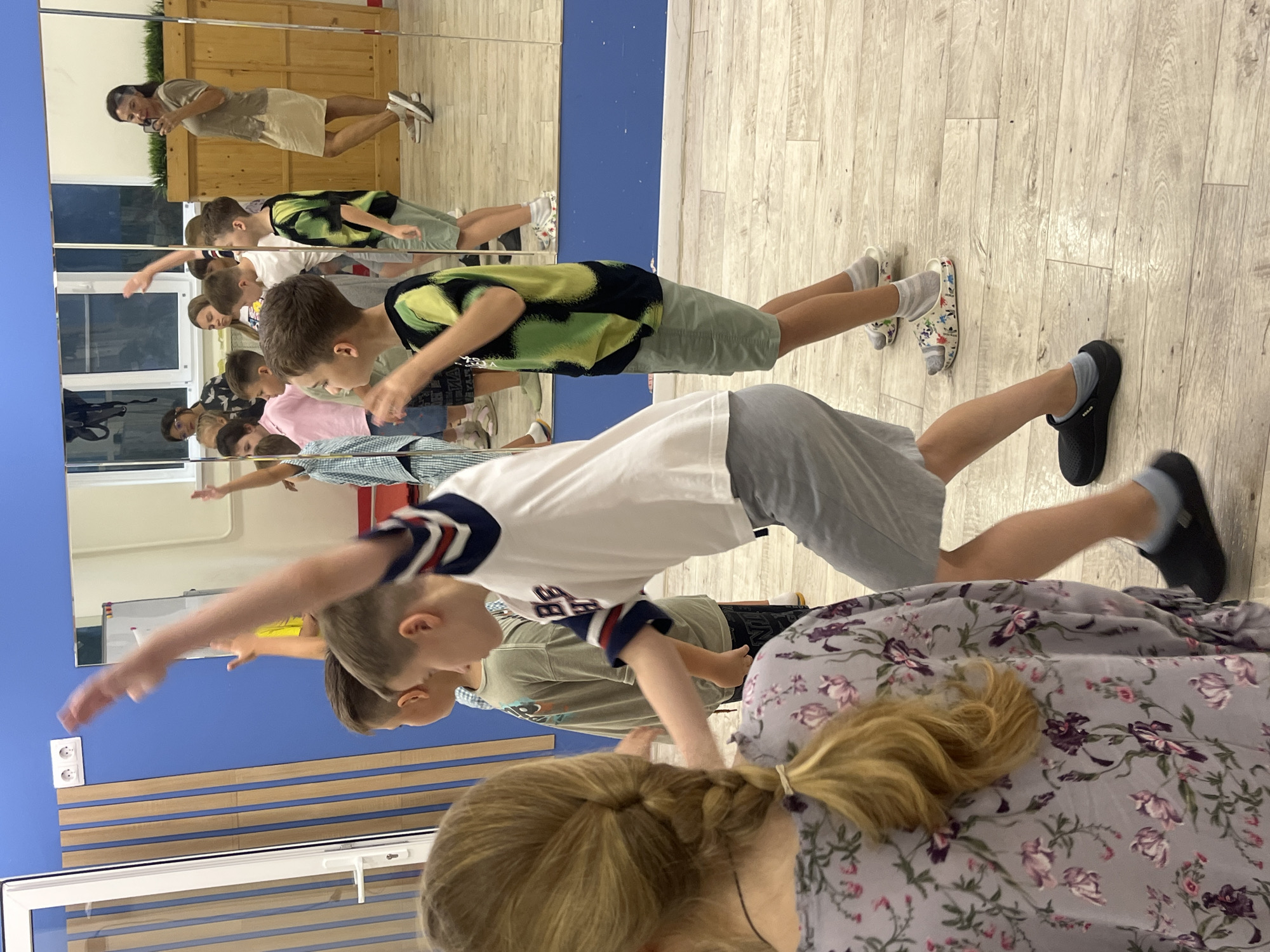 Kids' dance class underway in a mirrored Sochi studio