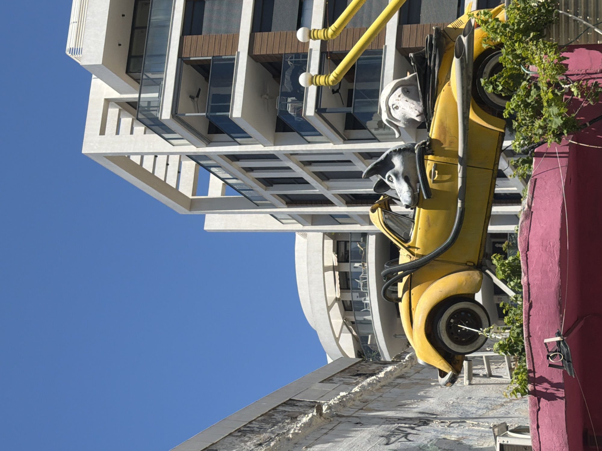 Tel Aviv outdoor scene with modern architecture and art installation