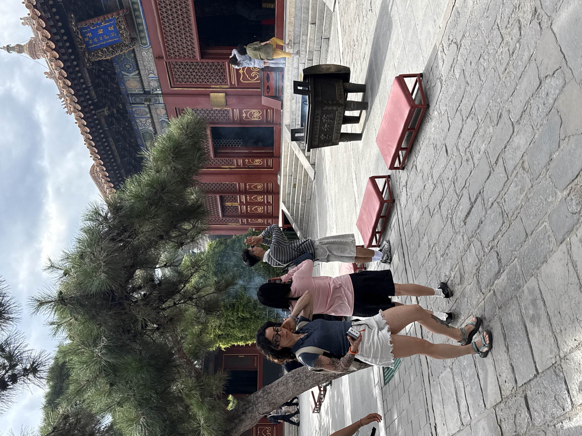 Temple visitors pray, light incense at Beijing historic site