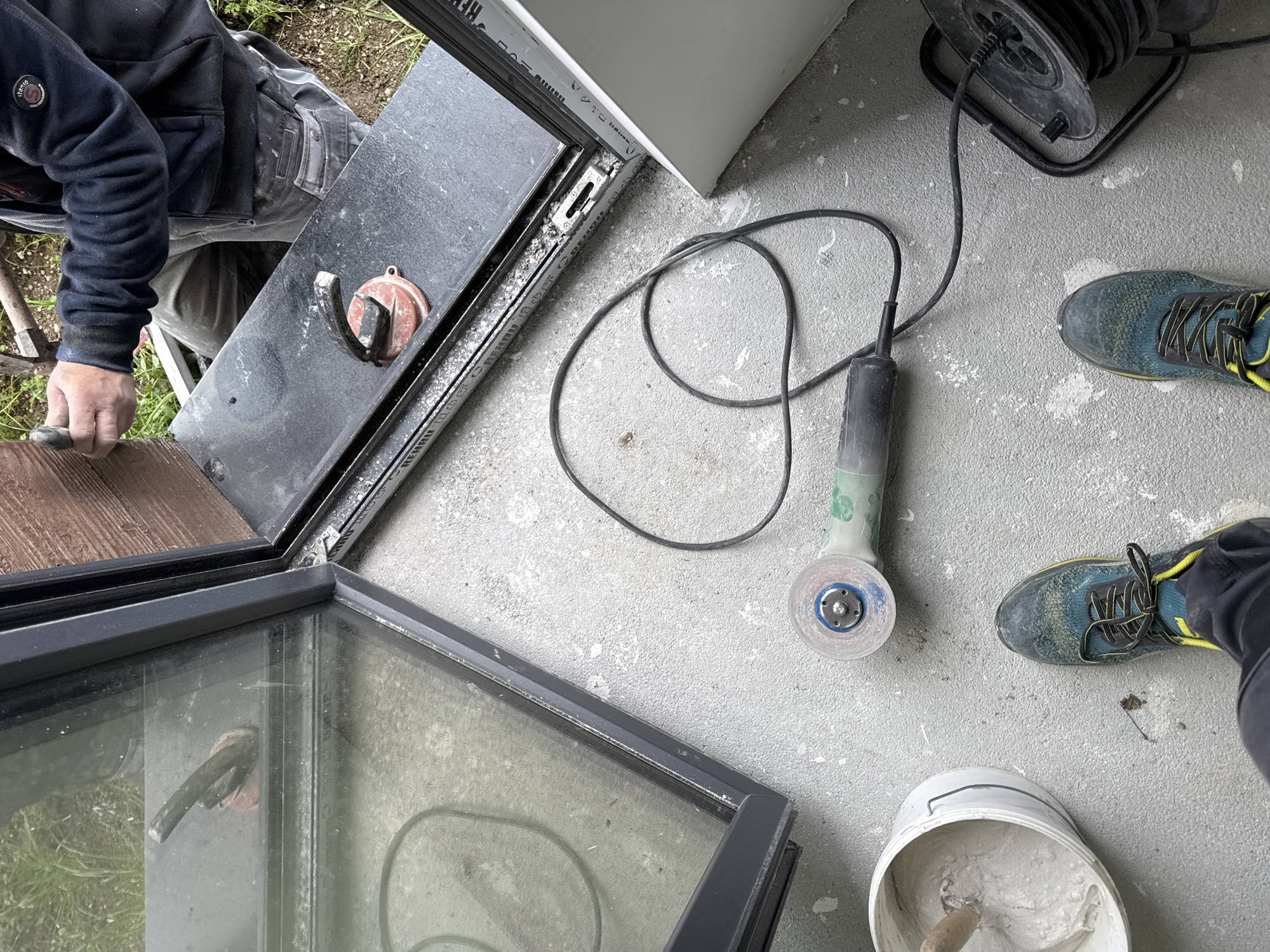 Construction worker installs window panel in Burgas