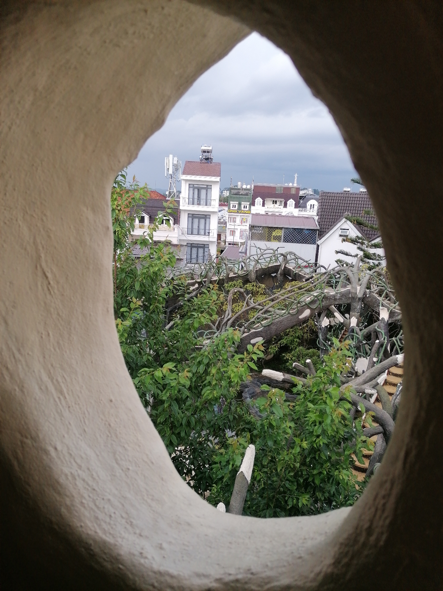 Tourist explores Vietnam's surreal Crazy House architectural attraction