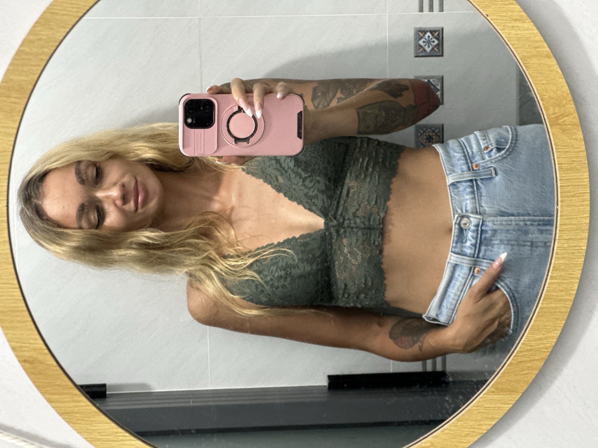 Woman Takes Mirror Selfies in Mũi Né Bathroom