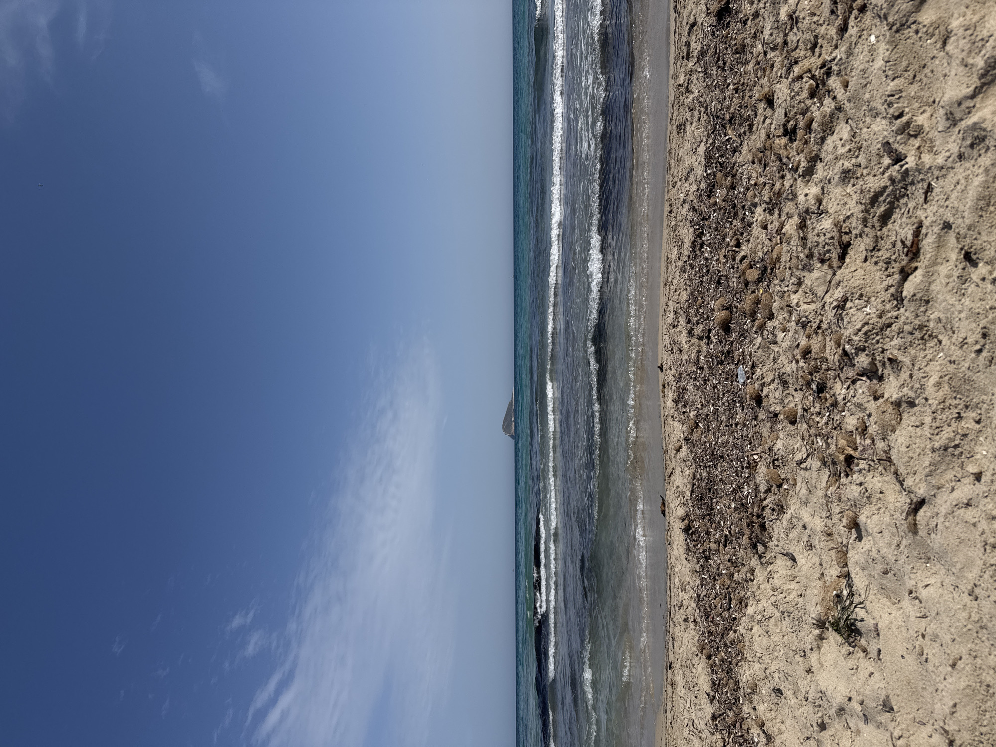 Beach scene with rocky outcrop documented in Finestrat Spain