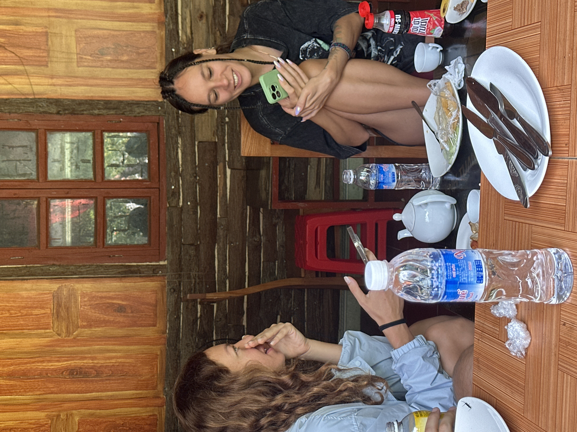 Tourists document dining and sightseeing in Vietnamese mountain commune