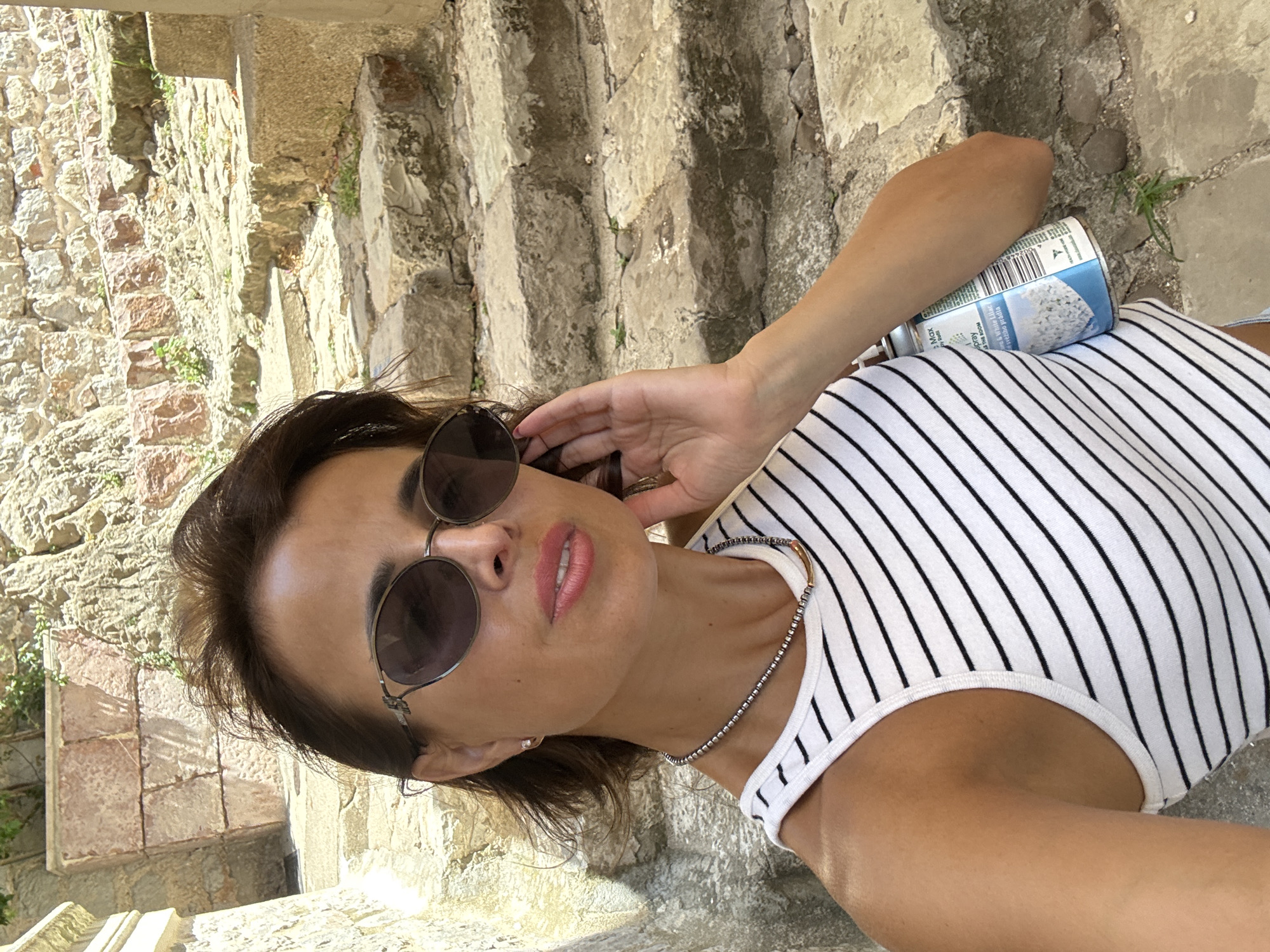 Sunny coastal day: alleyways, stone paths, and blue water