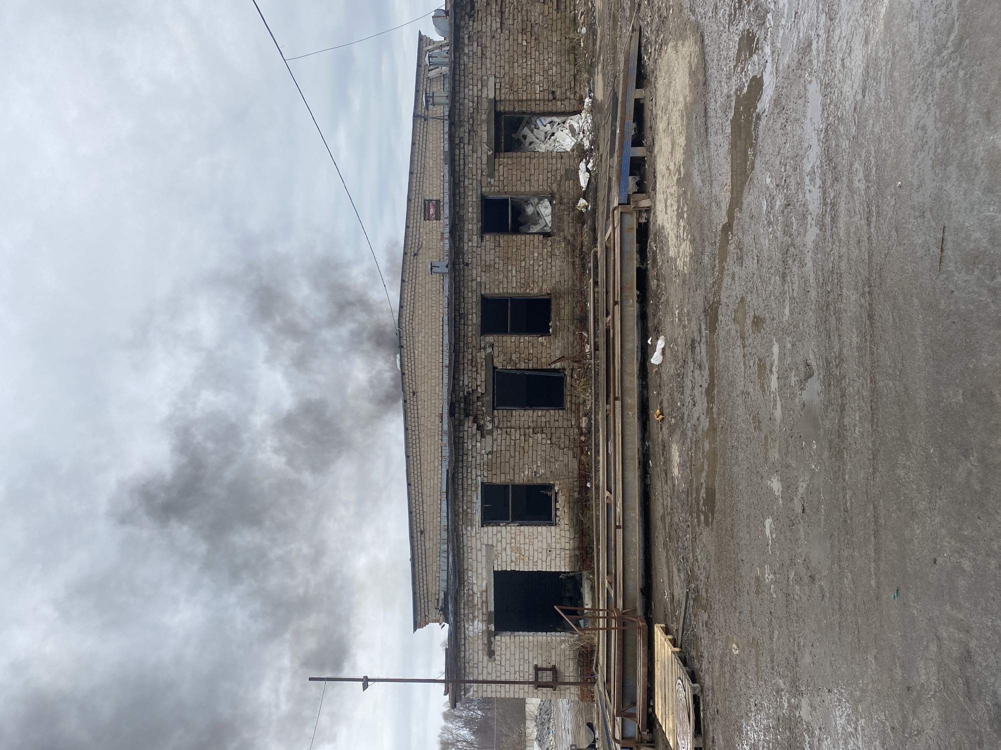 Building fire and incident documented in Ol'khovskoye, Russia