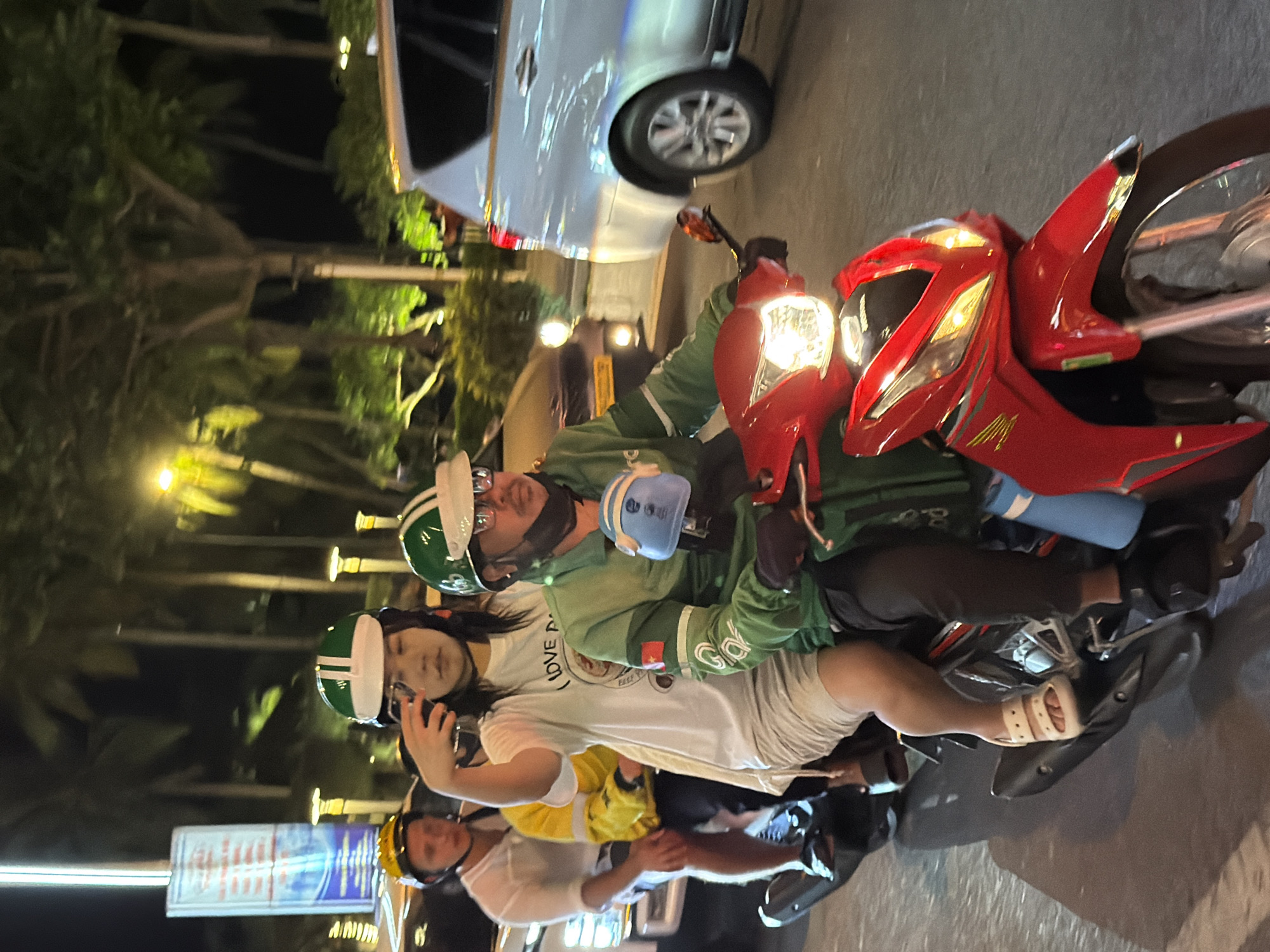 Nha Trang nightlife strip buzzing with traffic, clubs, and scooters
