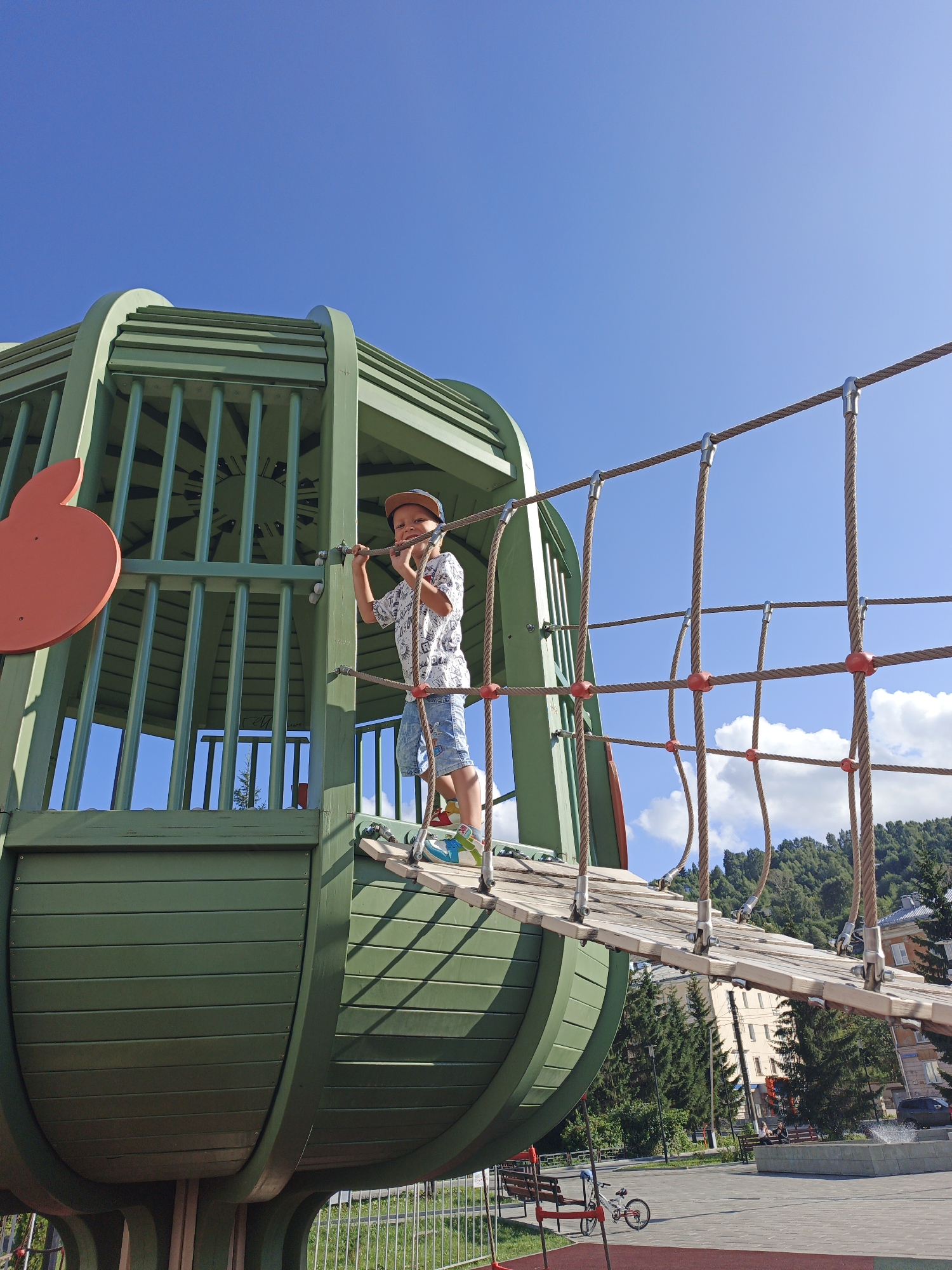 Afternoon at a Zlatoust playground with climbing structures and ice cream