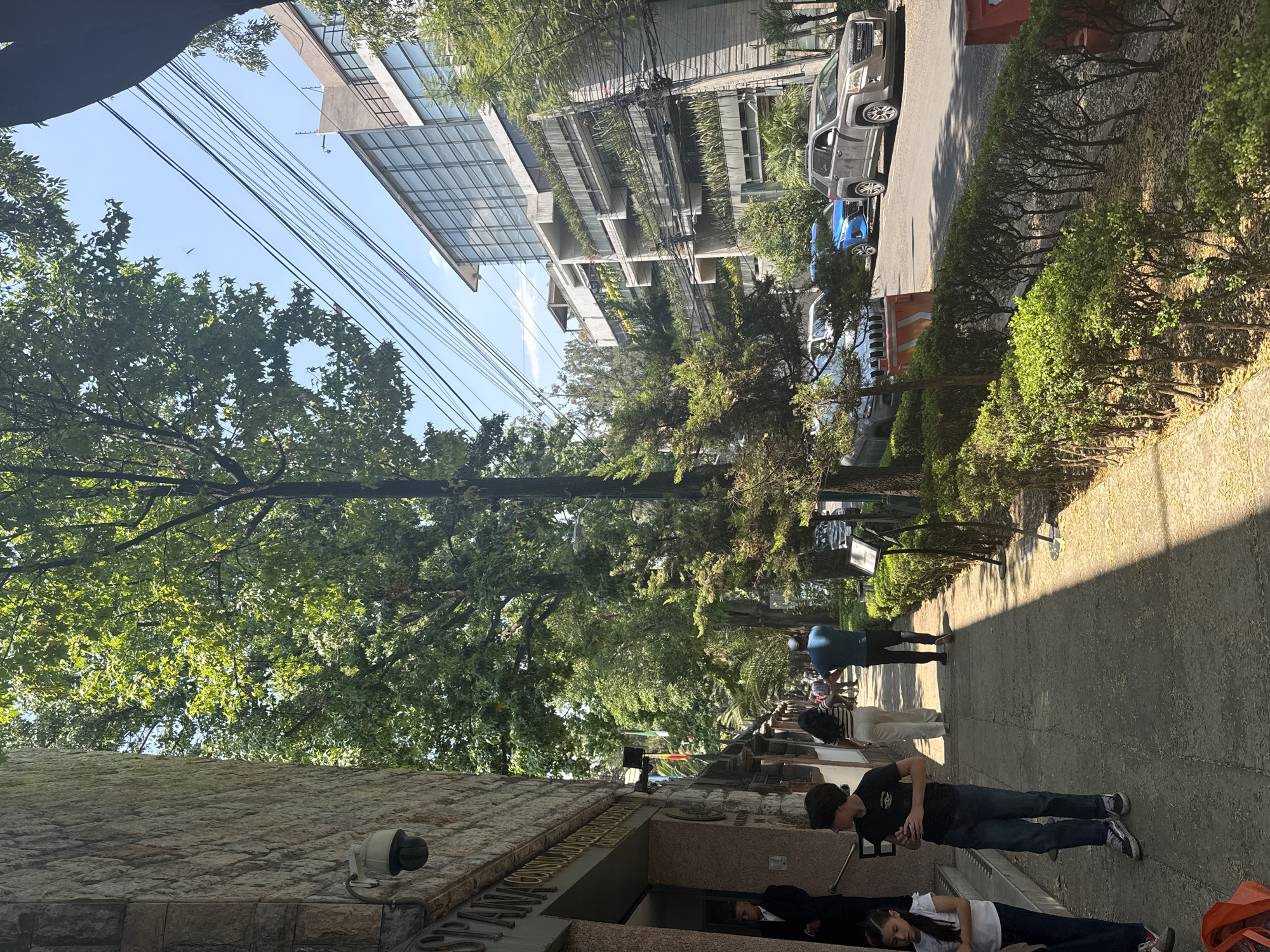 Ordinary street life documented in Mexico City daylight scene
