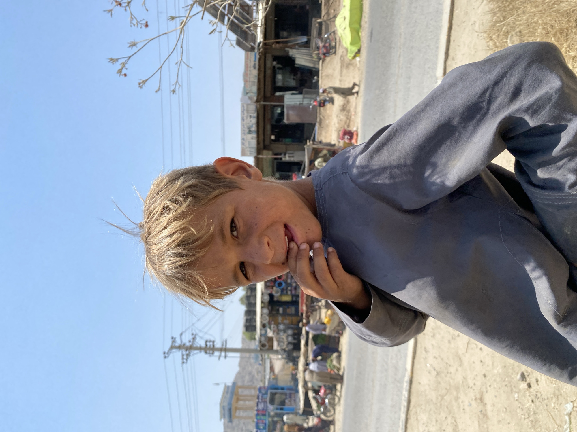 Community gathering in Kokran, Afghanistan streets and construction areas