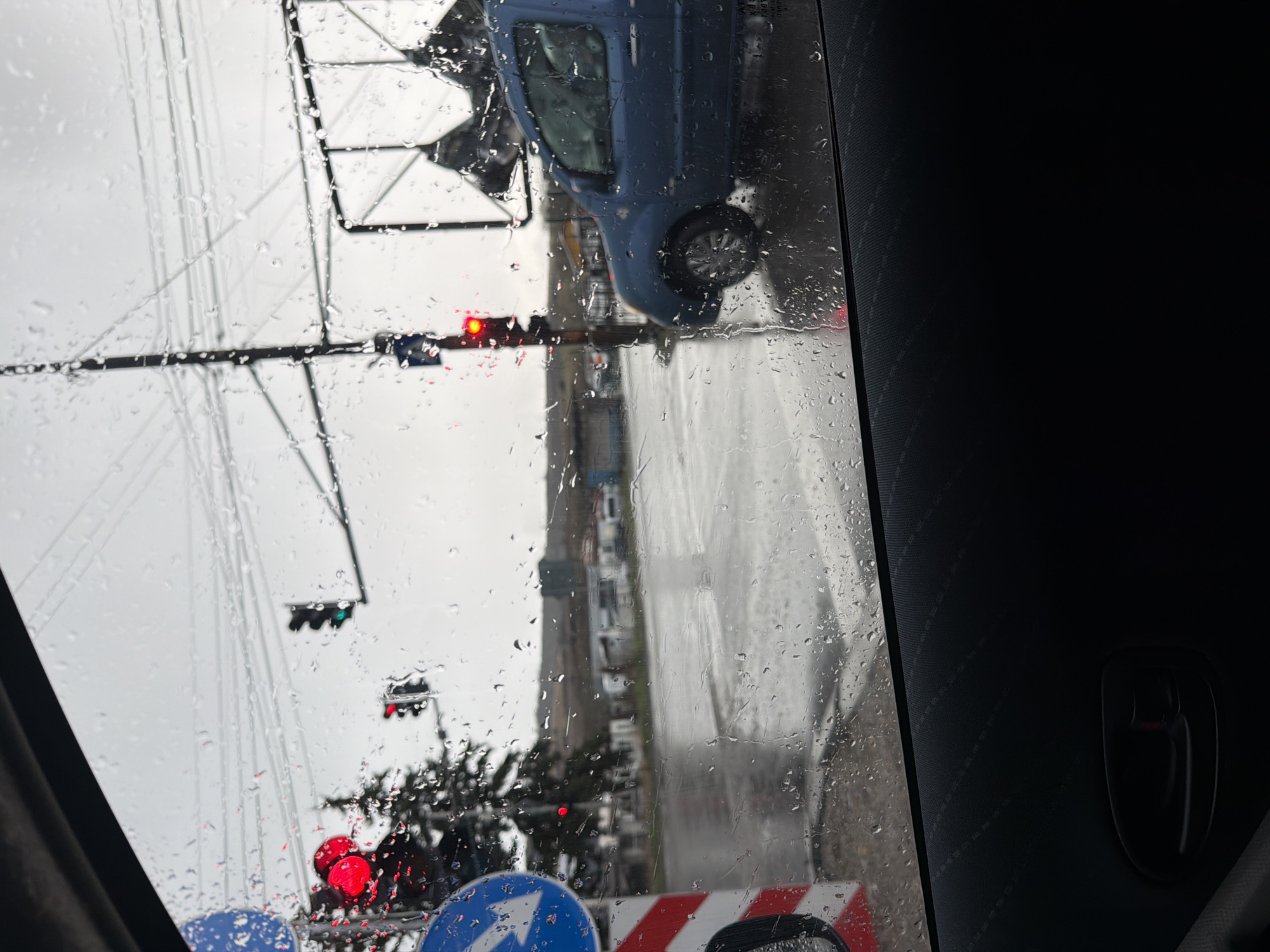 Rainy drive documented through Dragichevo, Bulgaria streets