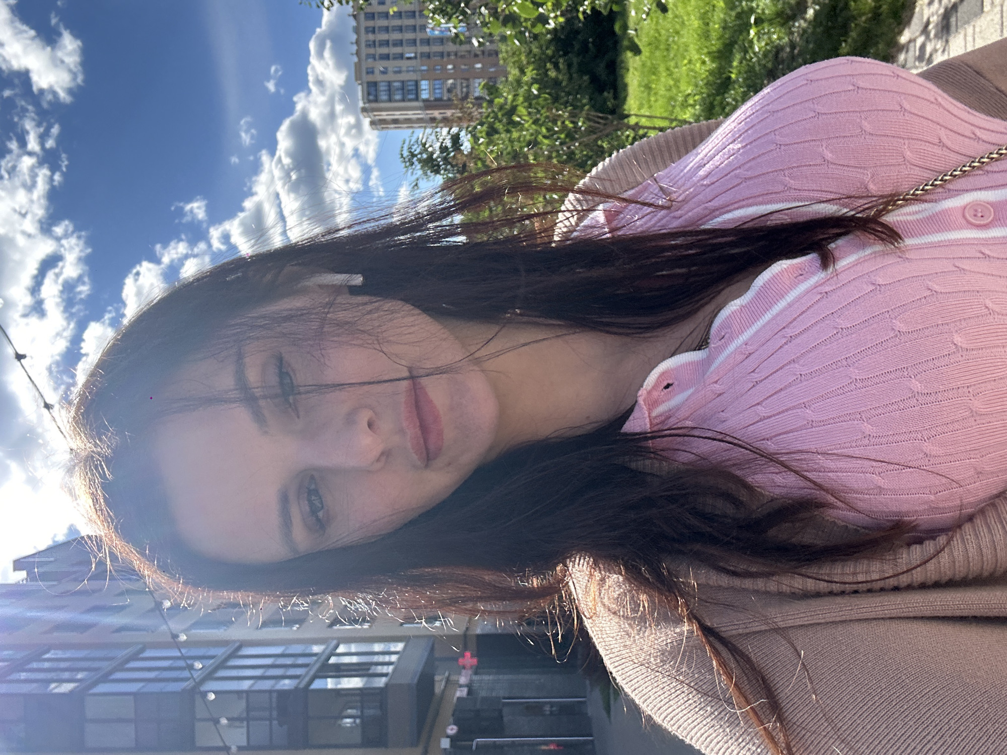 Out and about in a Russian-speaking city, pink knit in tow