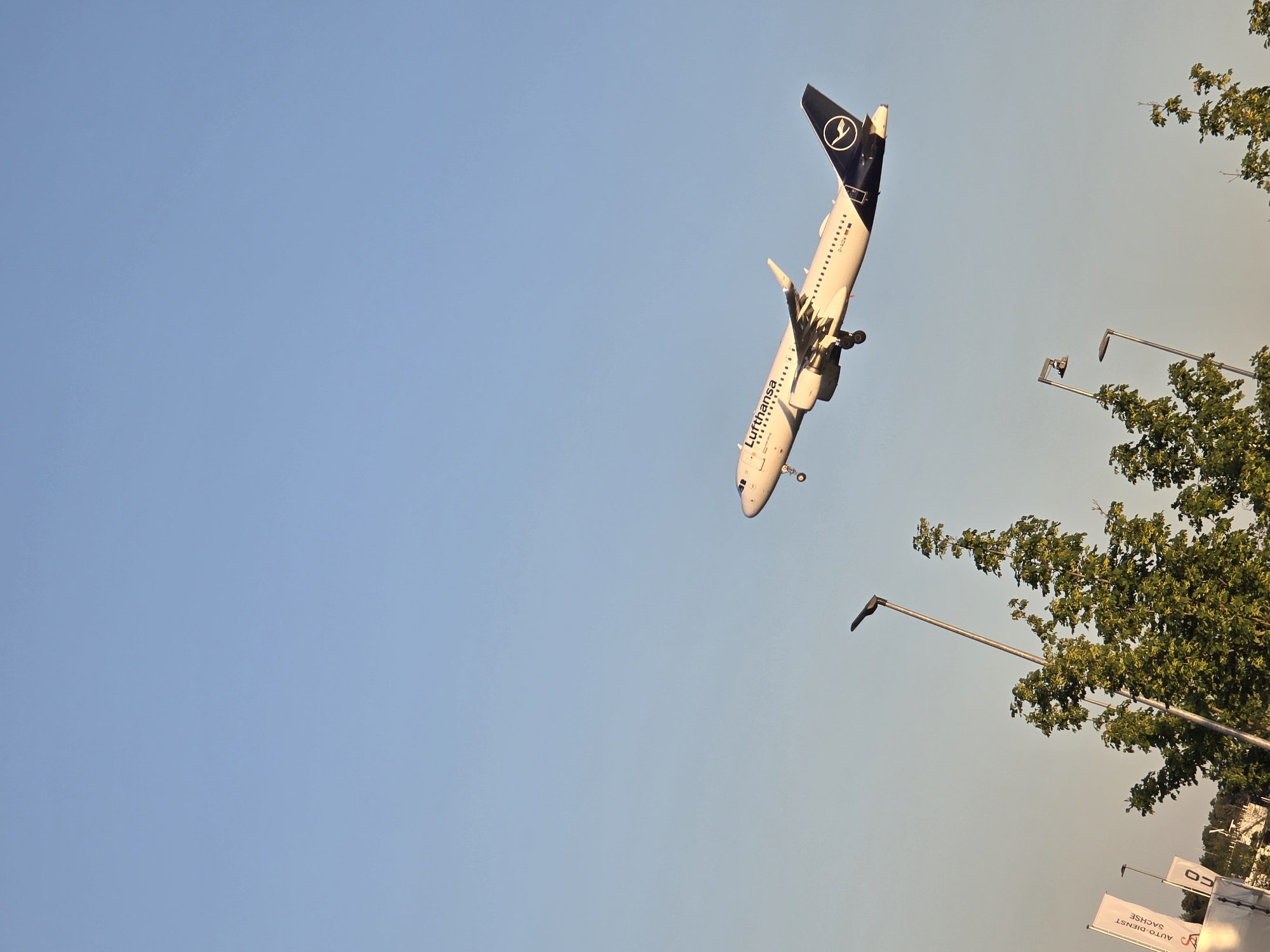 Plane spotting near Frankfurt Airport, with a random bollard thrown in