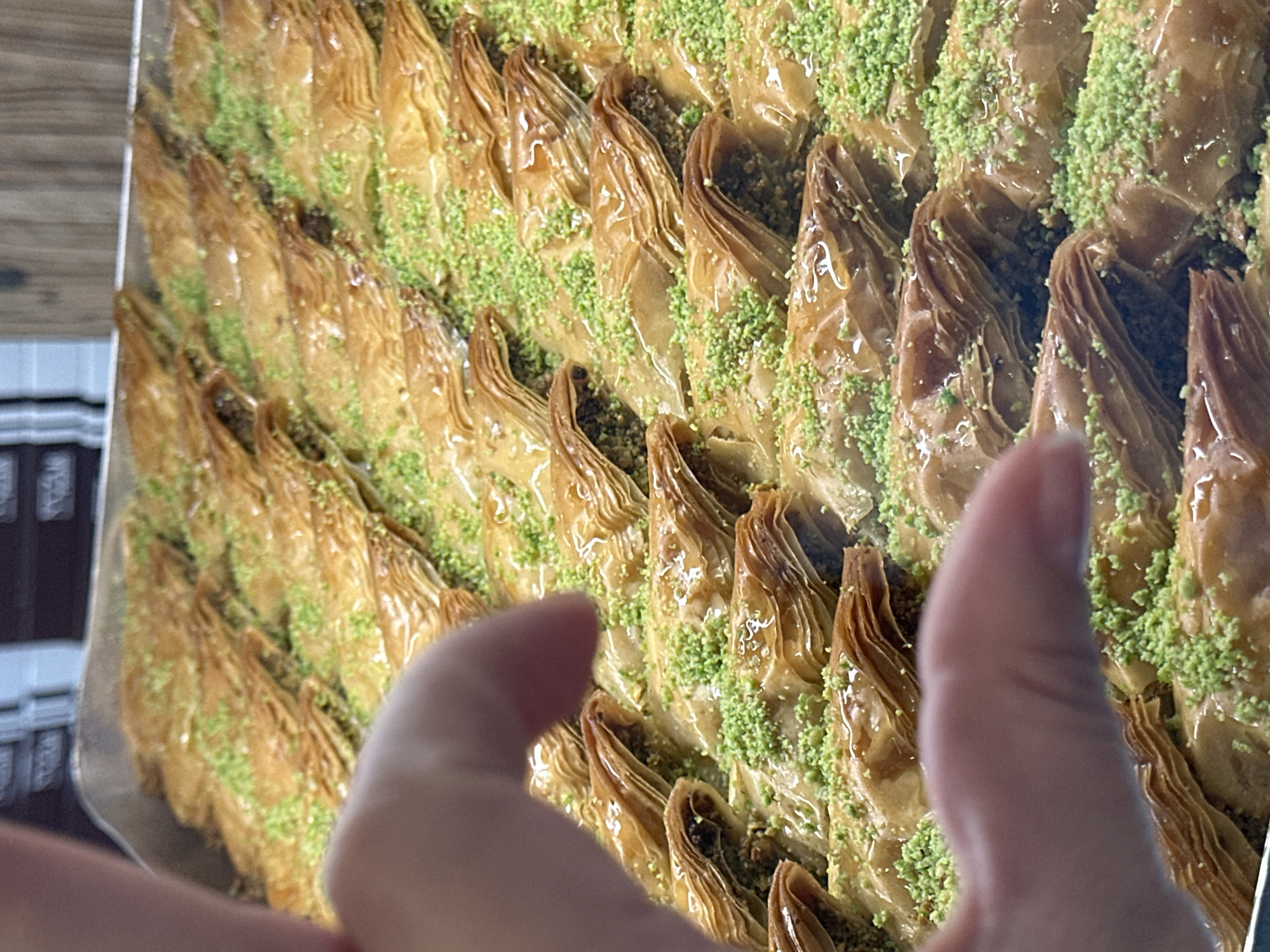 Trays of baklava and kunafa at a Krefeld sweet shop