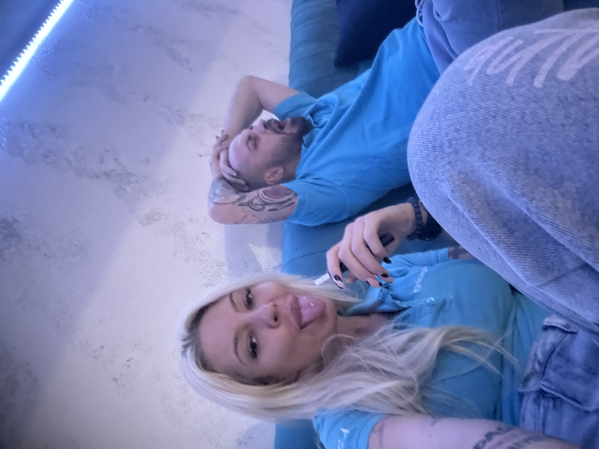 Couple relaxes at modern Plovdiv lounge during afternoon visit
