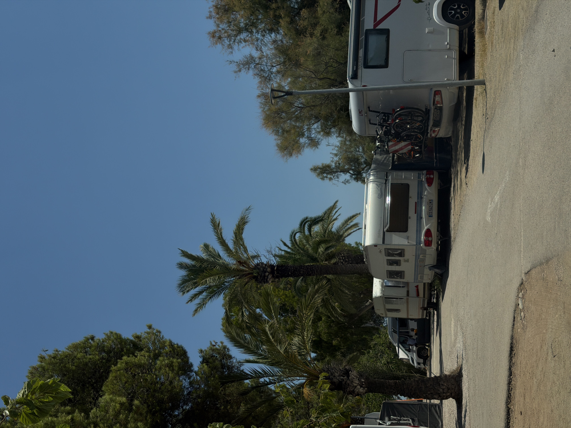 Alcanar campsite: motorhomes, bungalows, and blooming greenery