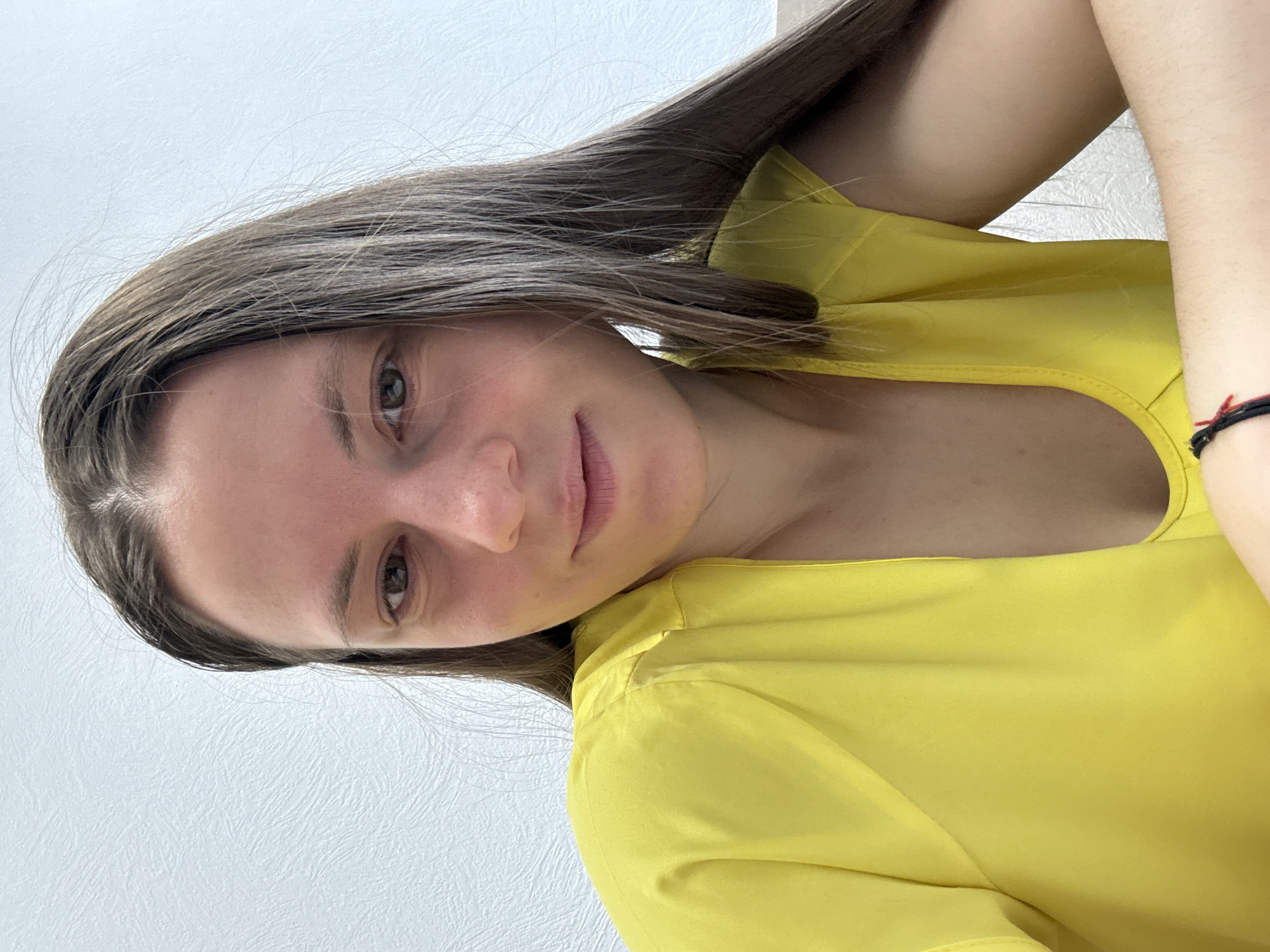 Woman photographed multiple times indoors in Chaikovsky, Russia