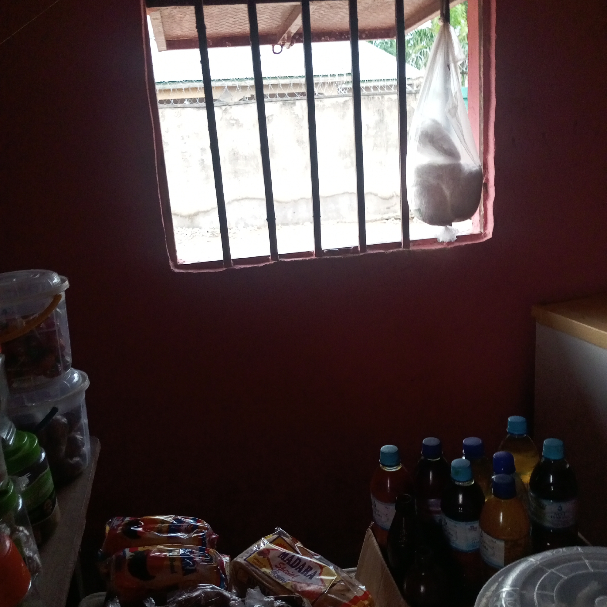 Small shop interiors and word-card images from Howayi, Nigeria