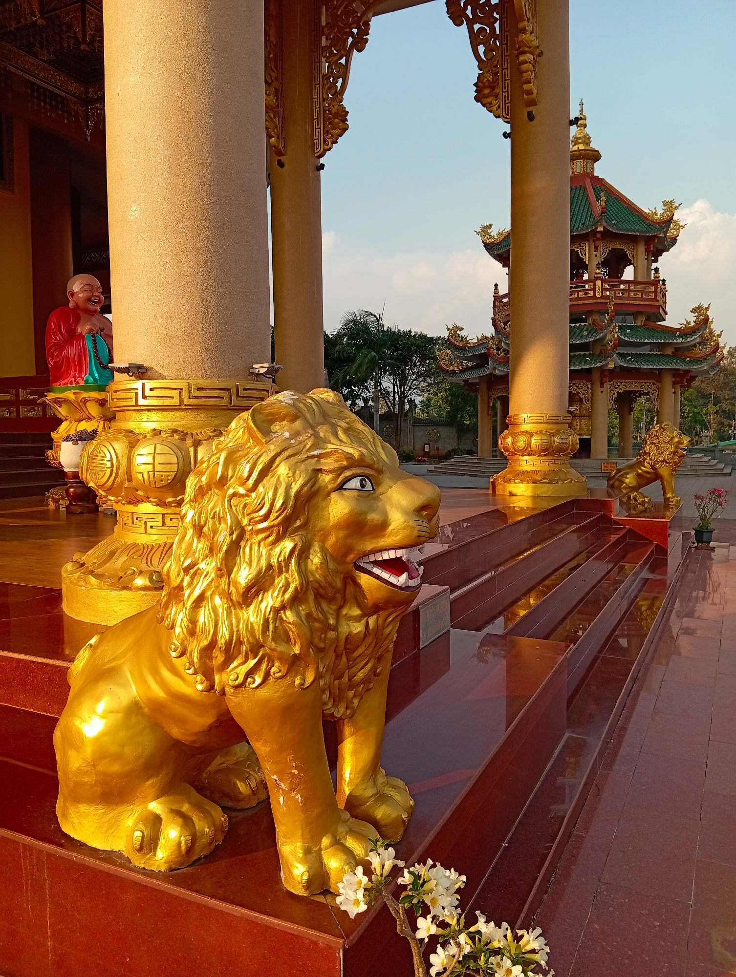 Buddhist pagoda complex captured during golden hour in Vietnam