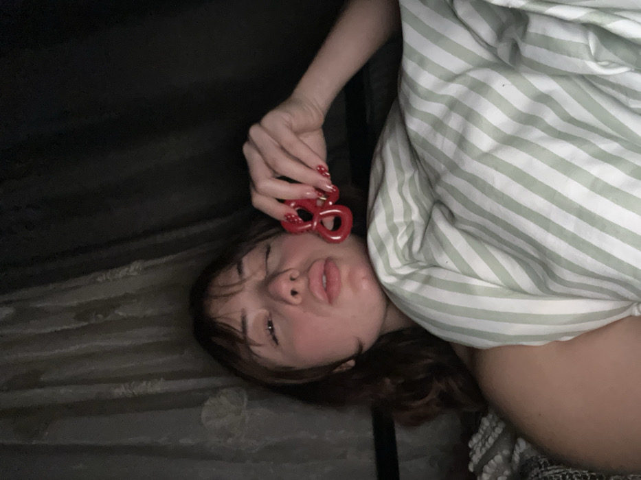 Woman takes playful bedroom selfies in Schiltigheim, France