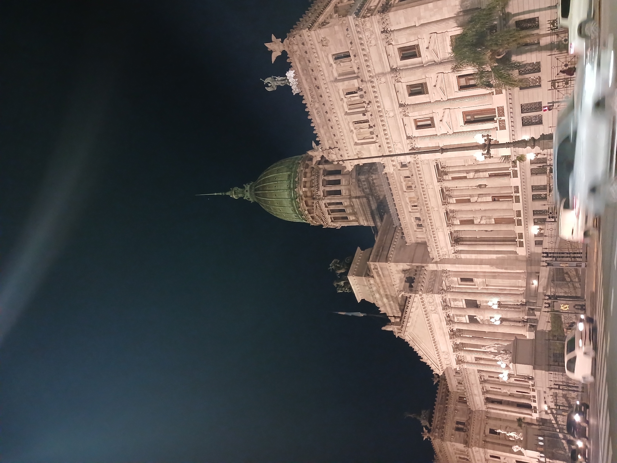 Nighttime scenes captured around illuminated Argentine Congress building in Buenos Aires