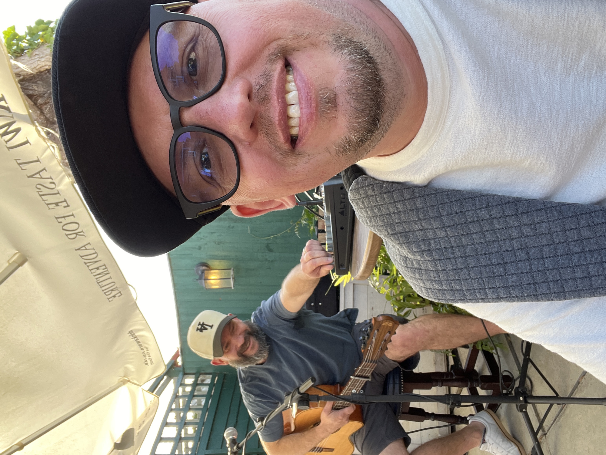 Outdoor social gathering with live guitar, Guildford park