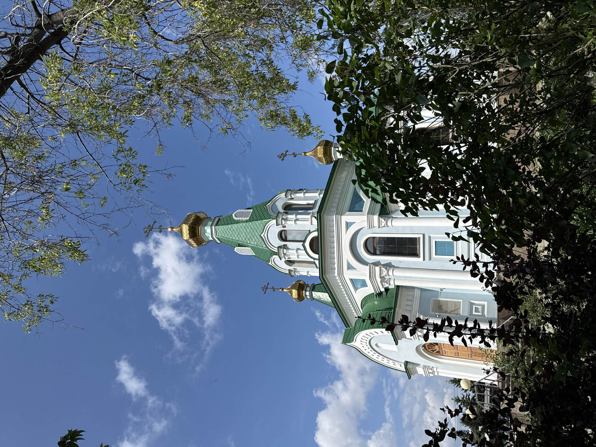 Yekaterinburg landmarks: railway station, Orthodox church, city streets