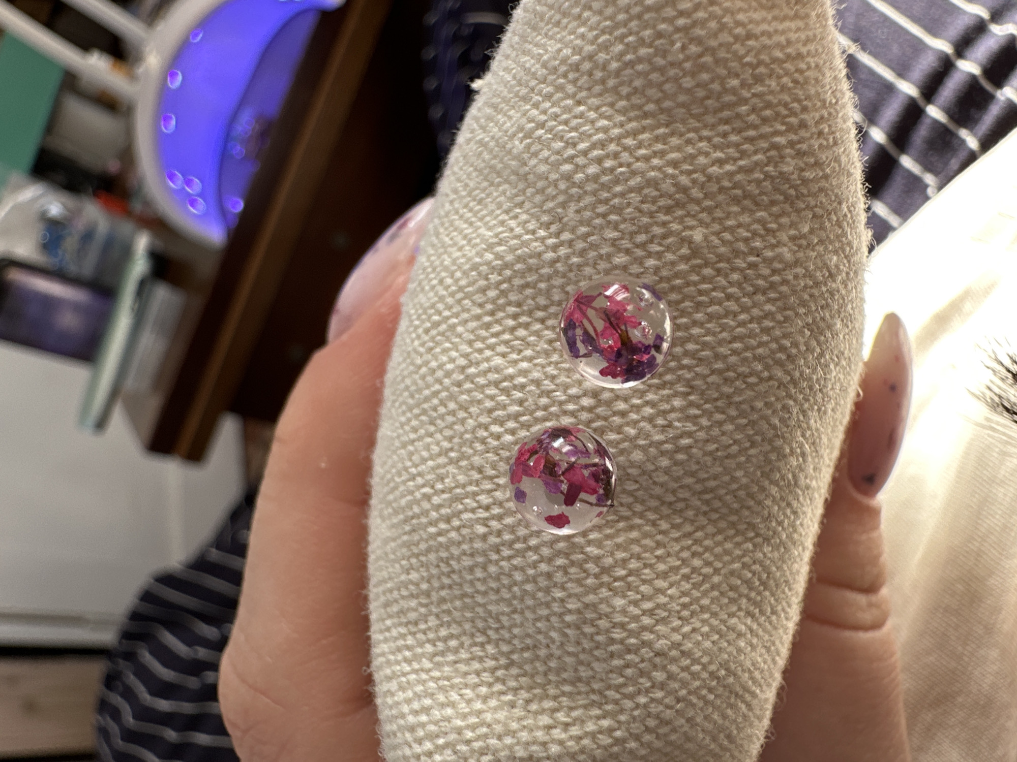 Bulgarian artisan crafts floral resin jewelry in afternoon session