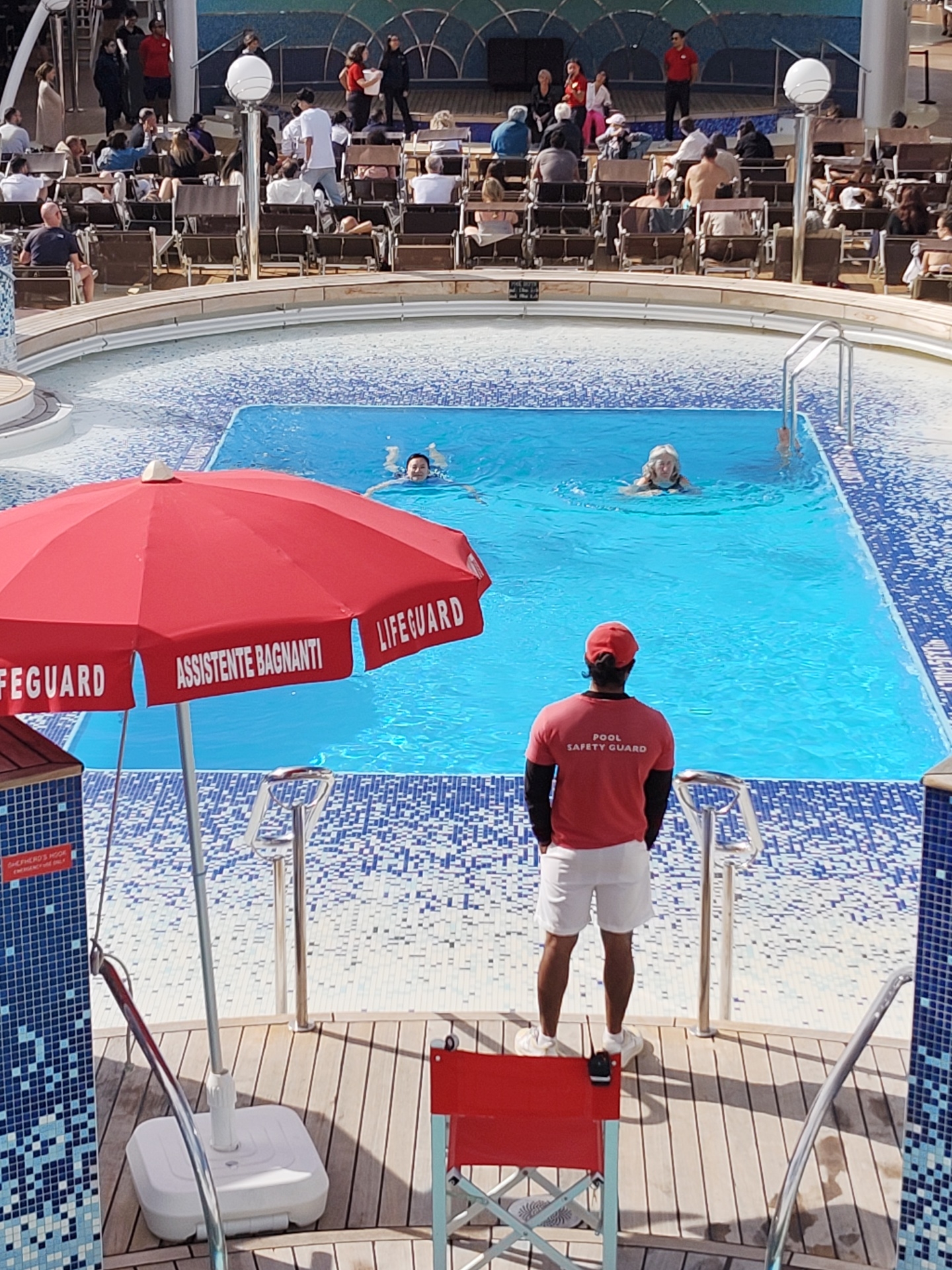 Cruise passengers enjoy deck activities at Cagliari port