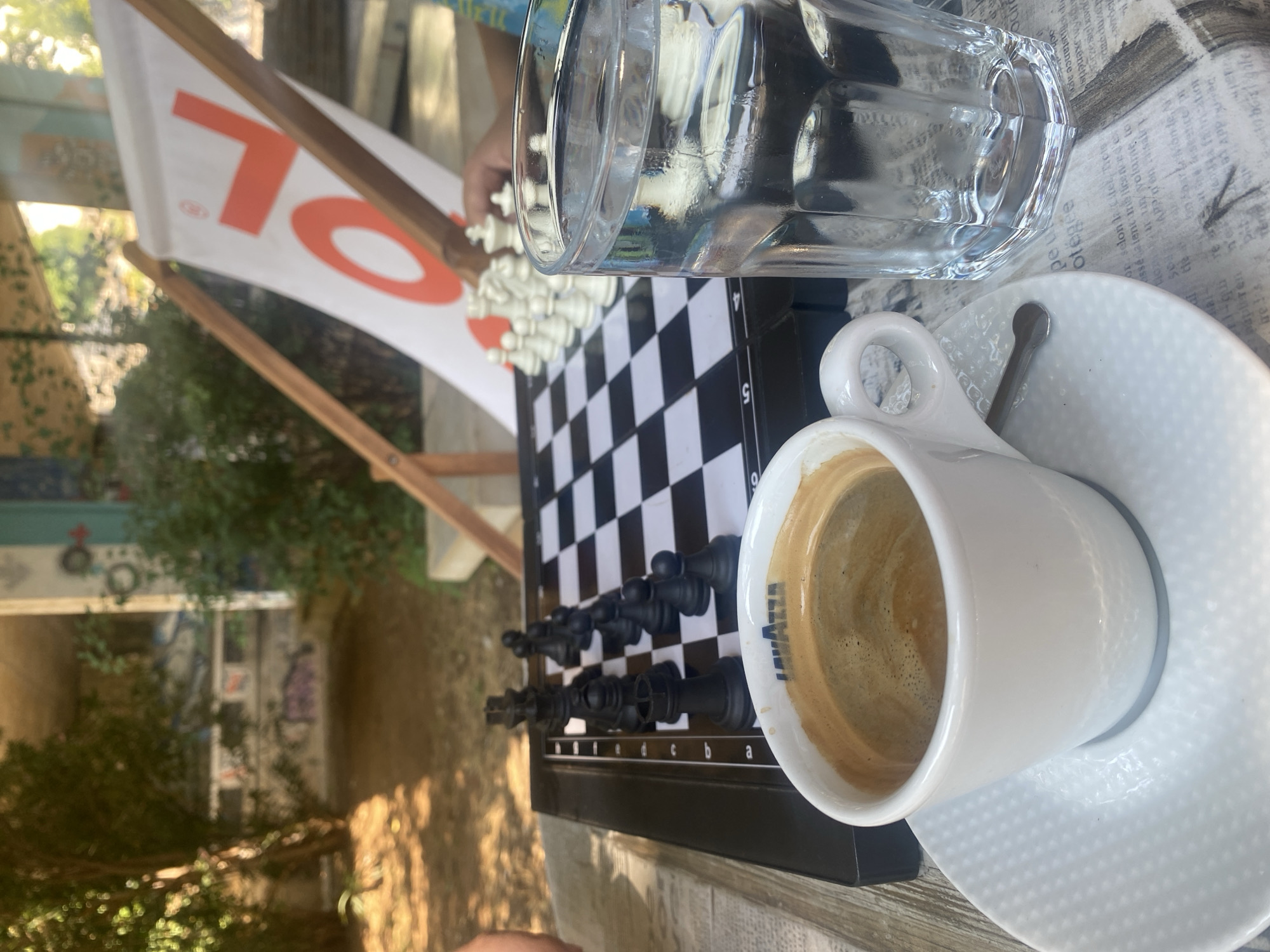 Chess, coffee, and river views on a Podgorica morning