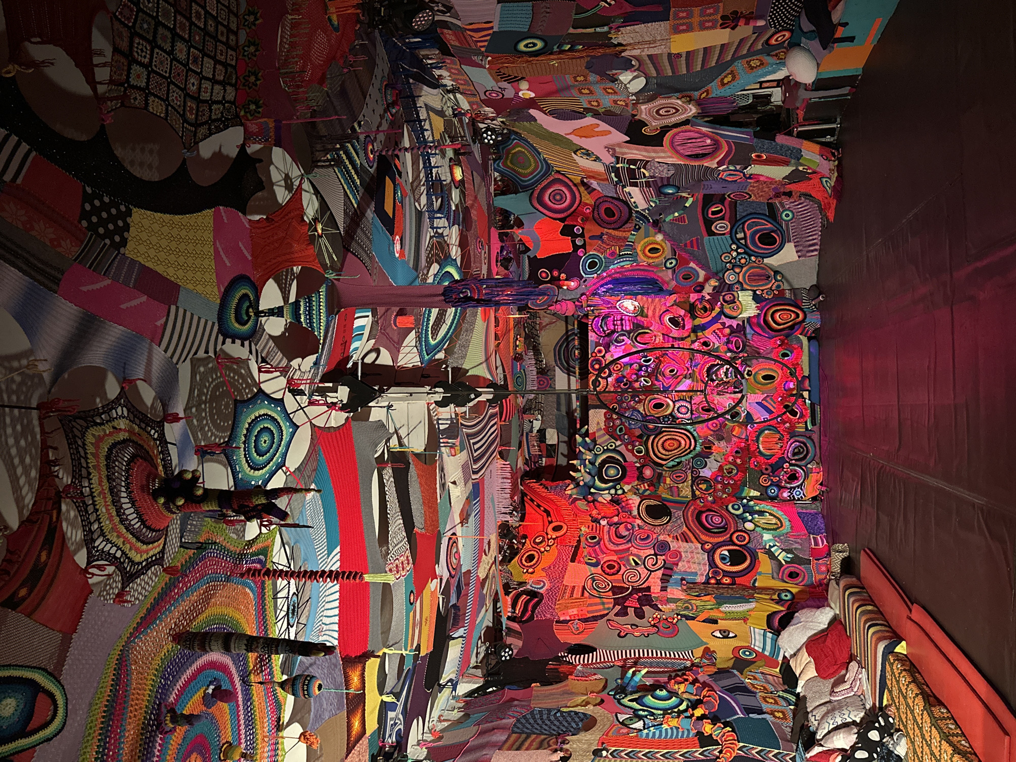 Colorful textile art installation documented in Berlin interior space