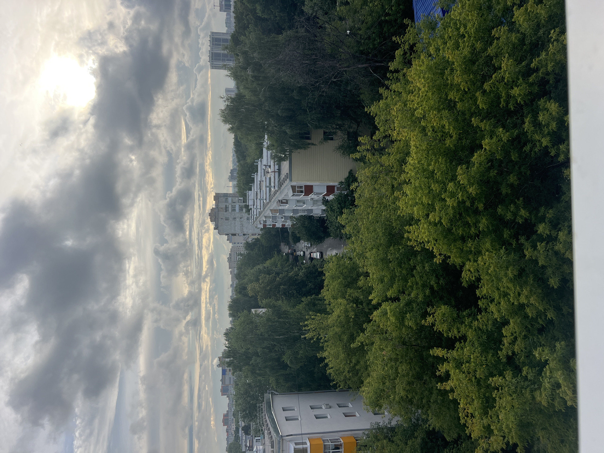 Green canopy, a forest-themed park, and Kazan's urban skyline