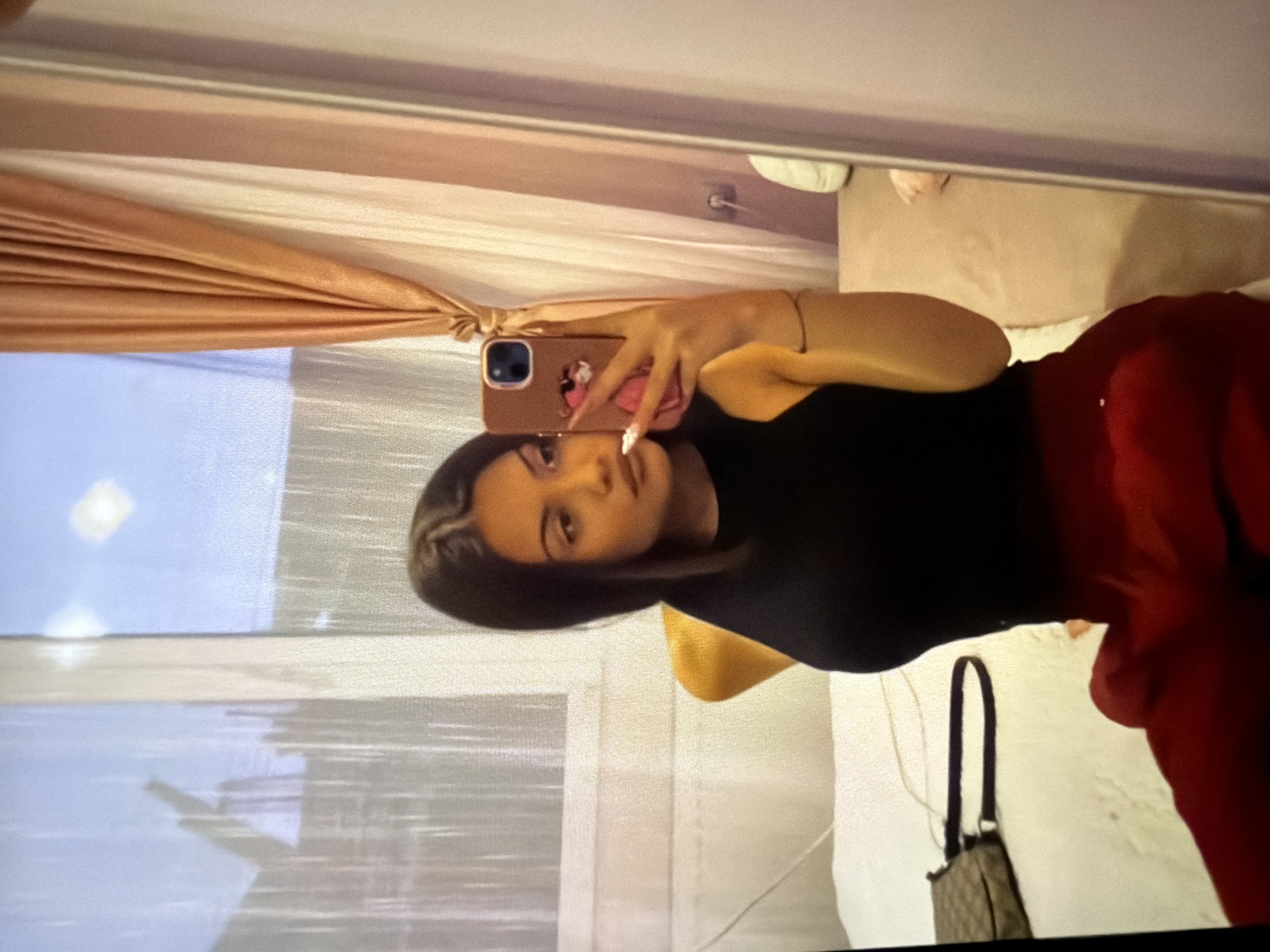 Woman takes mirror selfie in Kostinbrod, Bulgaria