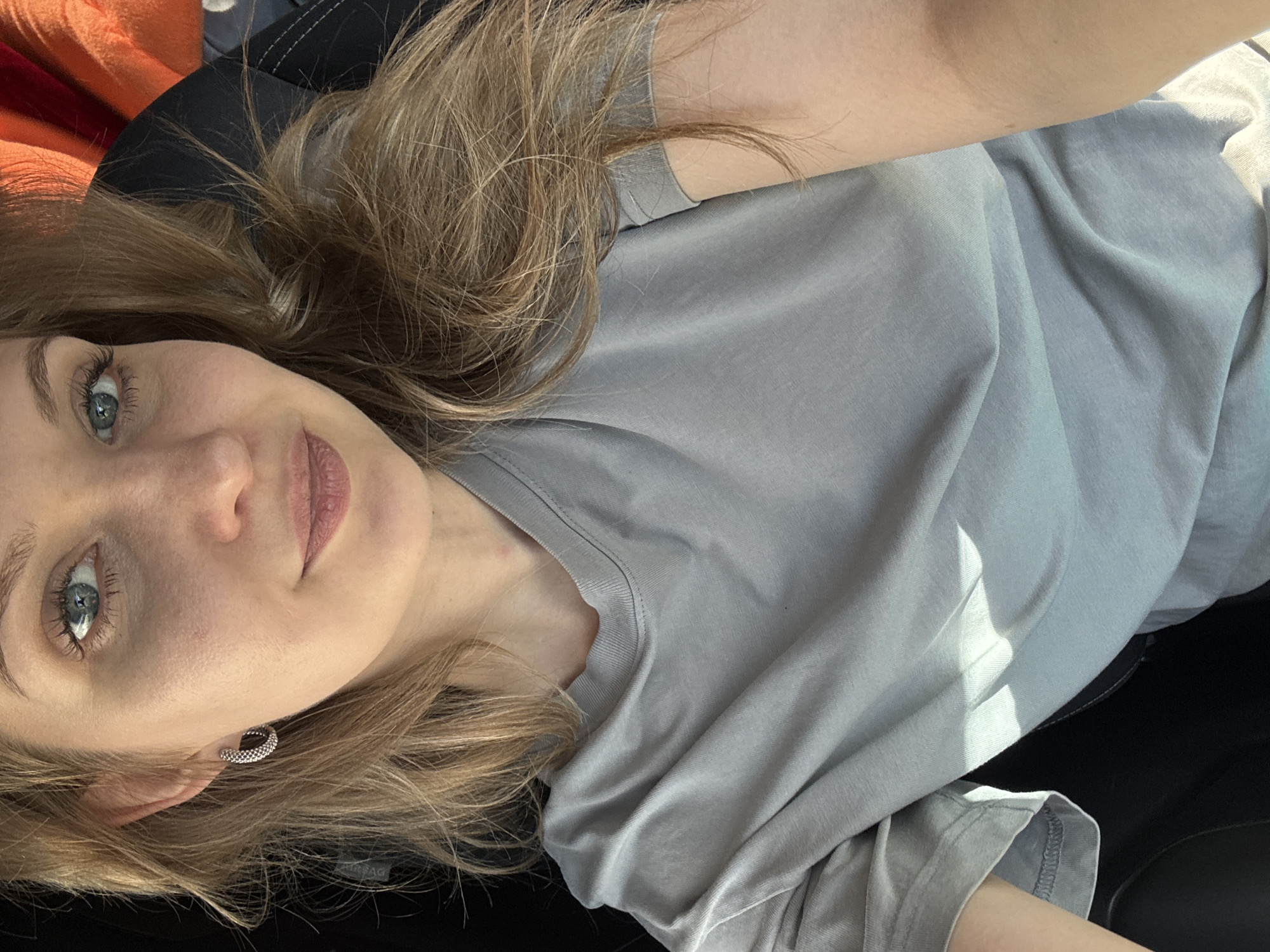 Woman observed resting in vehicle interior in Izhevsk