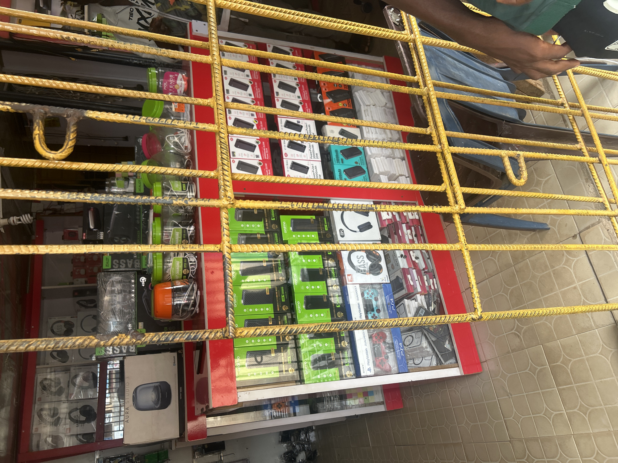 Electronics shops and street life in Ogbomosho's commercial district