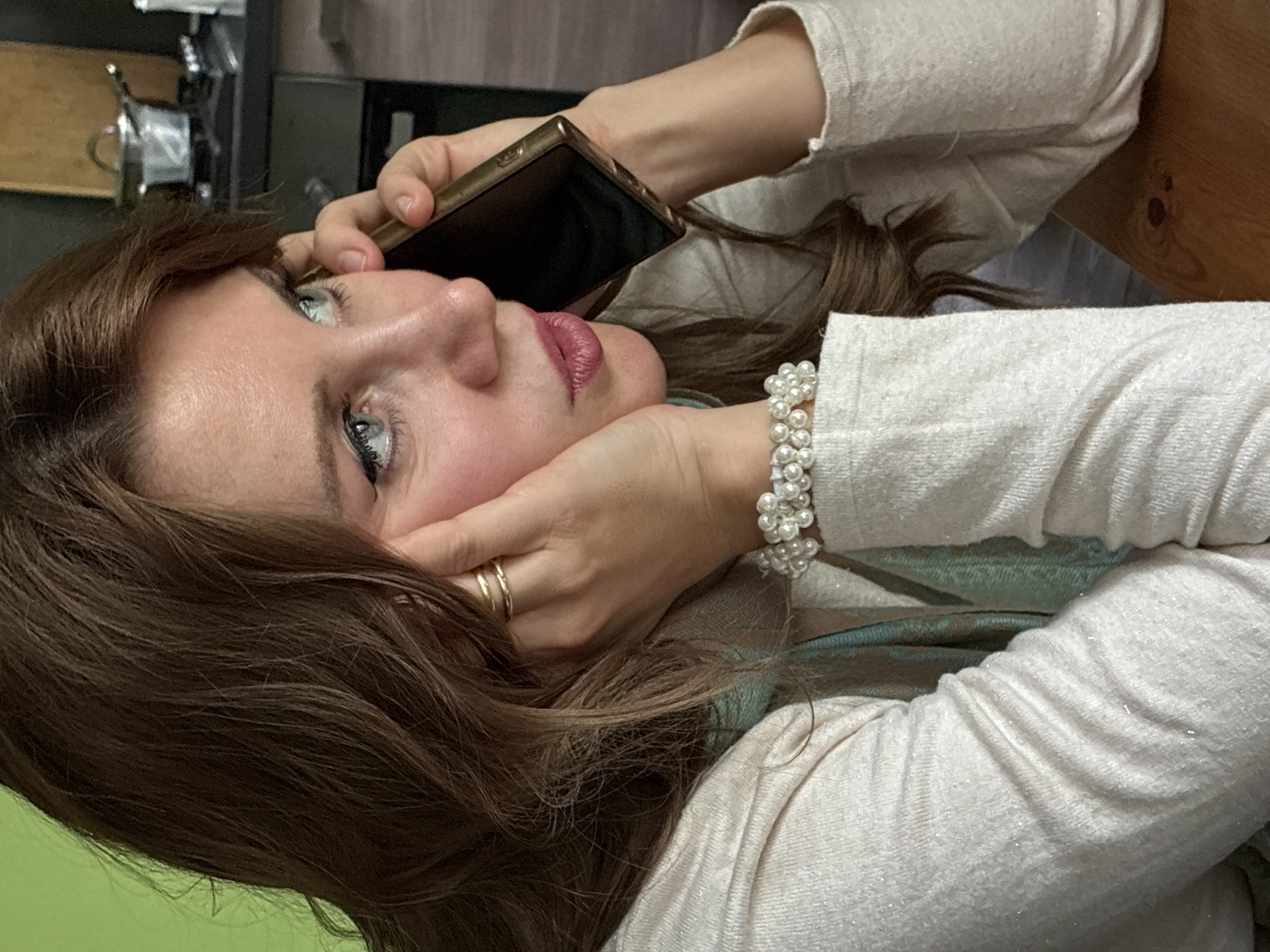 Women photographed using phones, taking selfies in Moscow homes
