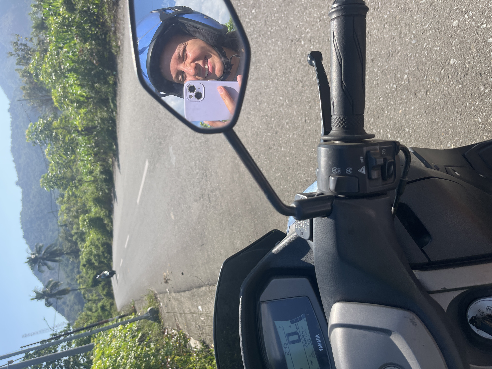 Scooter journey through rural Indonesian countryside near Taliwang